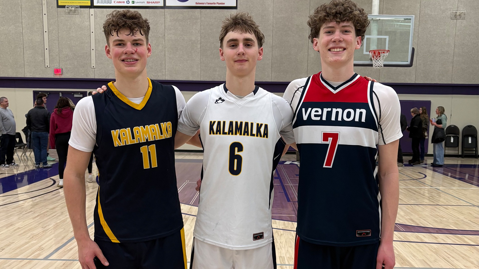 From left to right, incoming Heat men's basketball recruits Tylen Lewis, Mason Clerke and Dom Zaino pose following a high school basketball game in Vernon