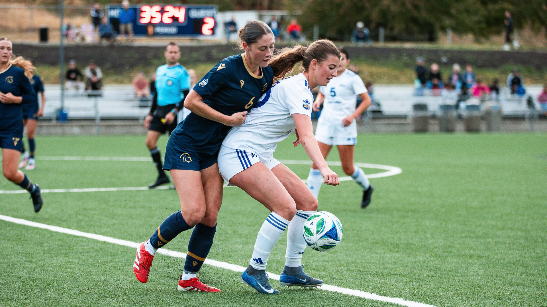 Maria Georgacacos of the UBCO women’s soccer team shields the ball against the TWU Spartans at Nonis Field.
