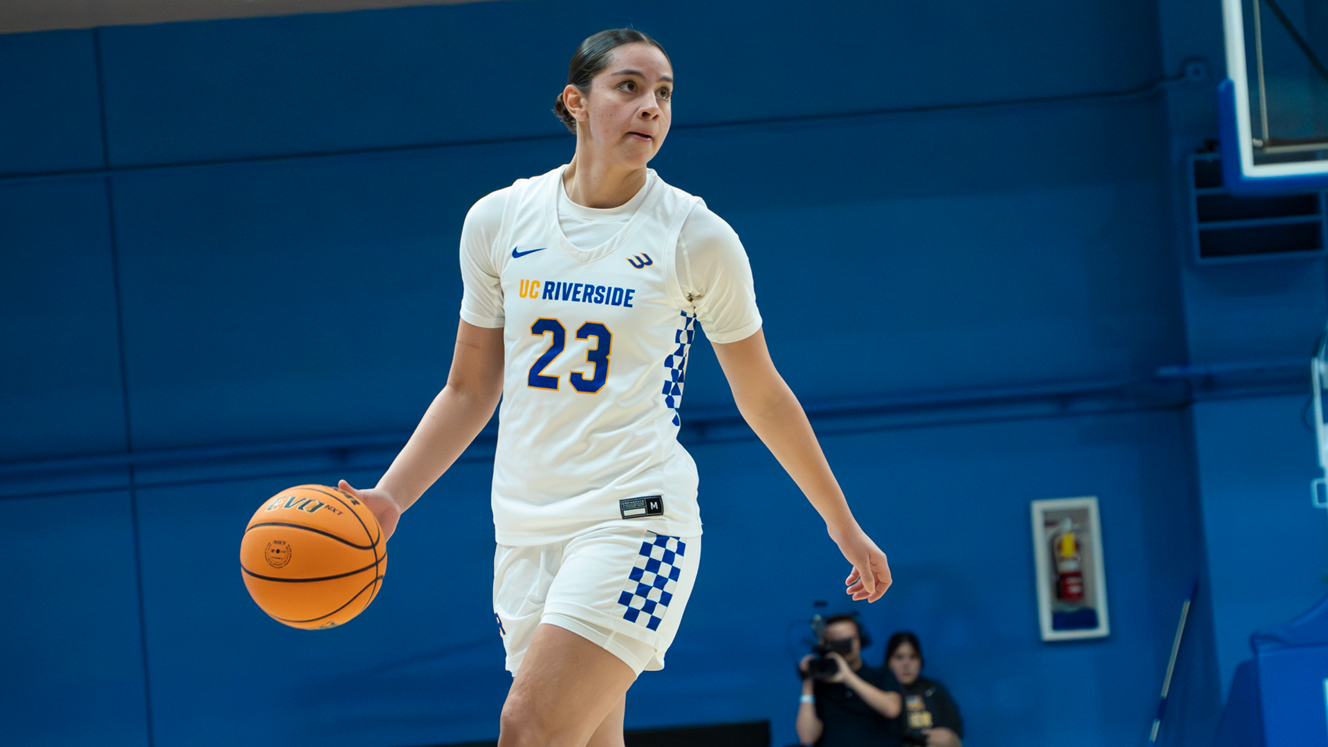 Maria Mejia dribbles the ball against Cal Lutheran