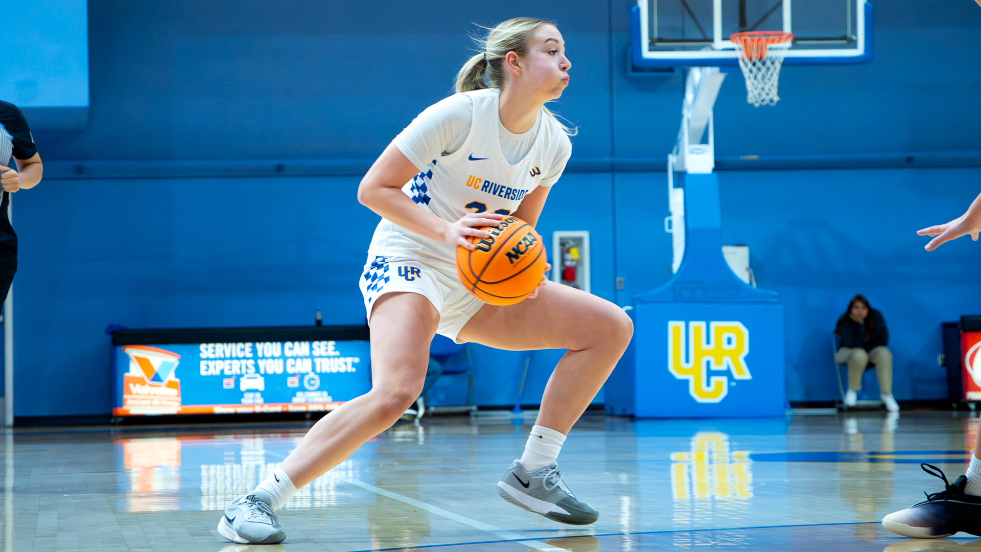 Taylor Swanson drives against UC Merced