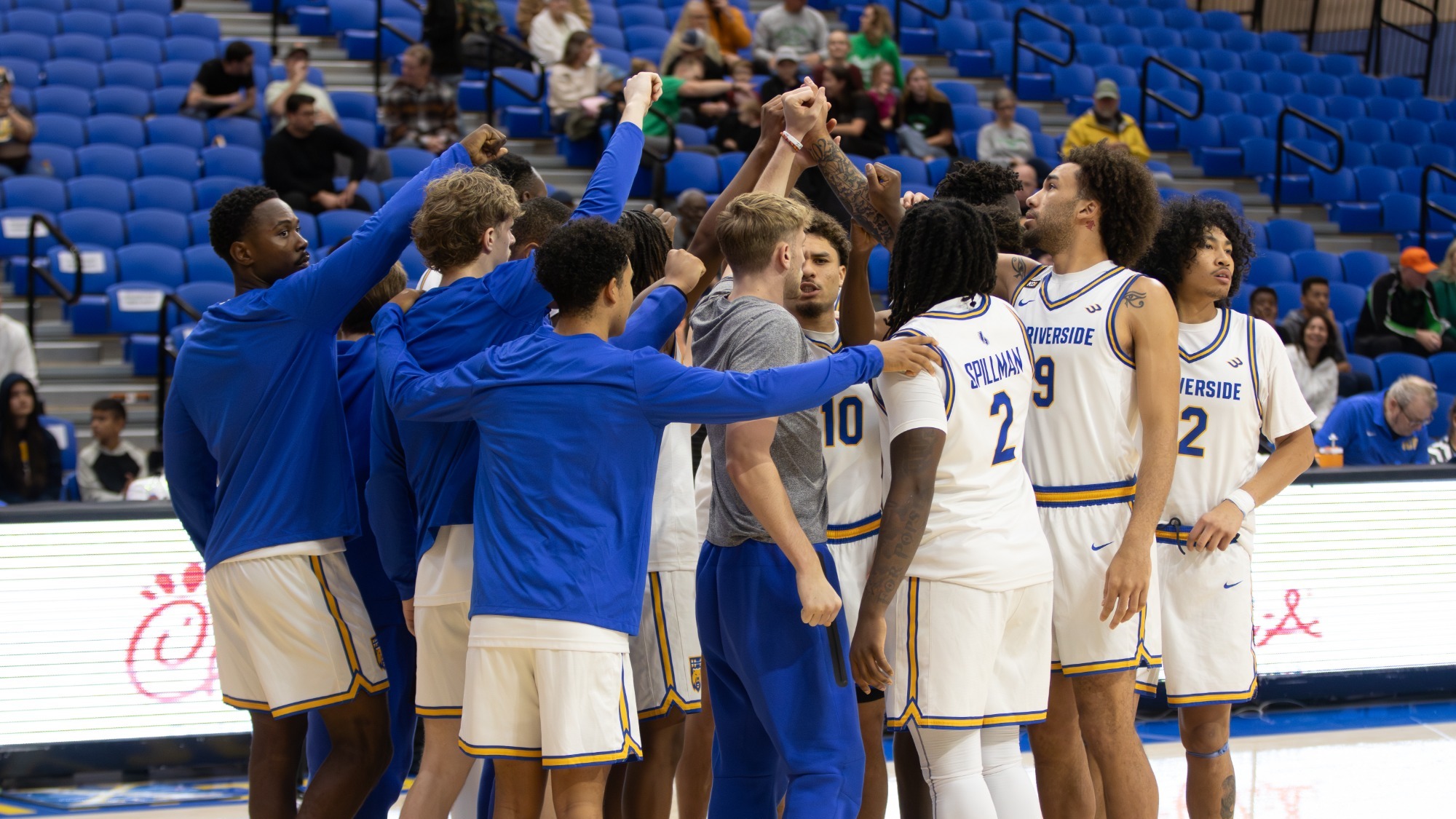 Men's Basketball Team Huddle