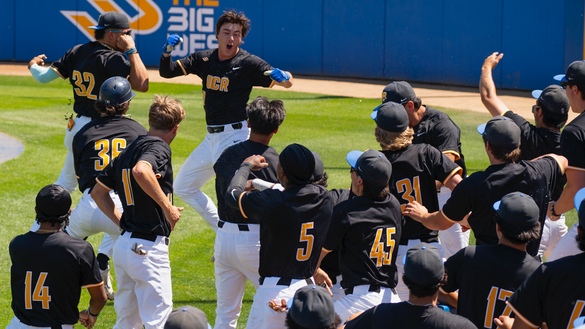 Lucas Bonham and team celebrate homer vs CSUB