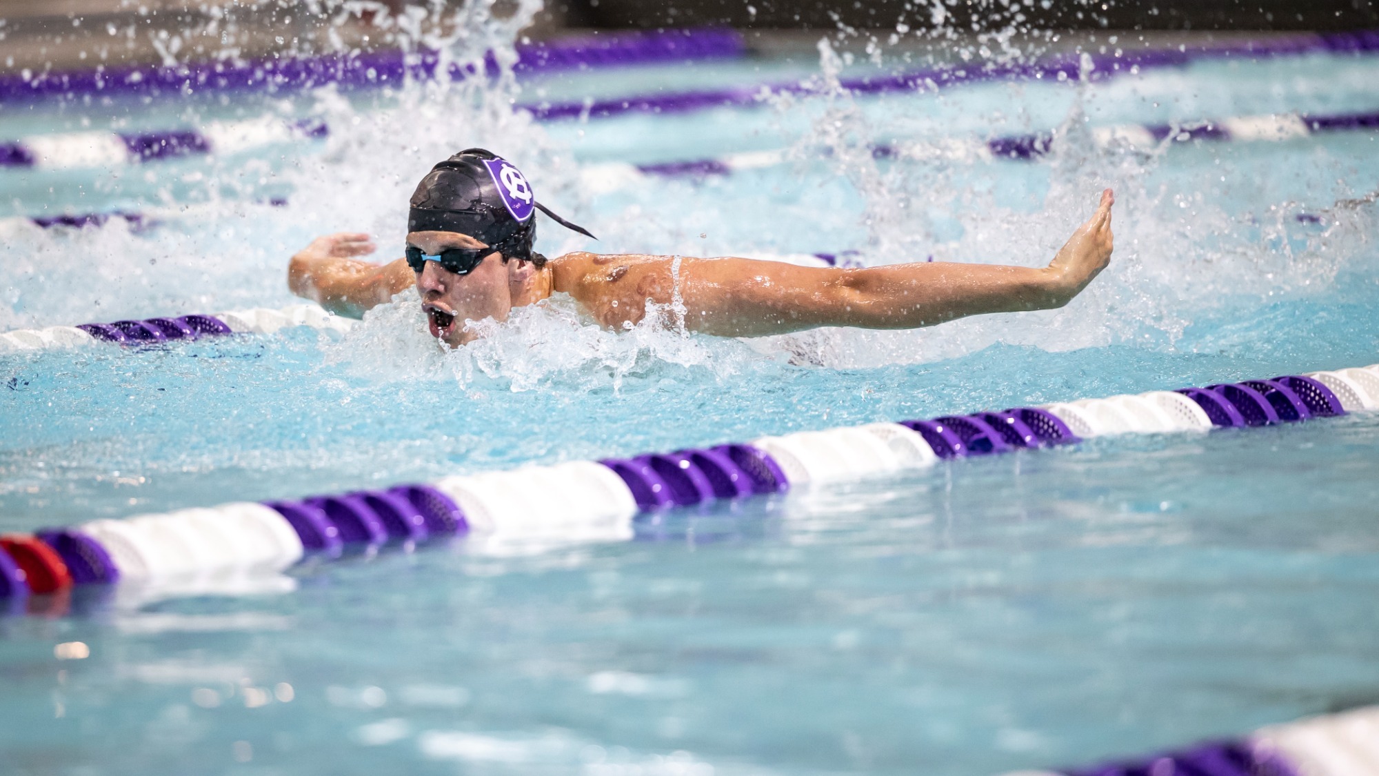 Men’s swimming and diving relay team break program marks at Patriot
