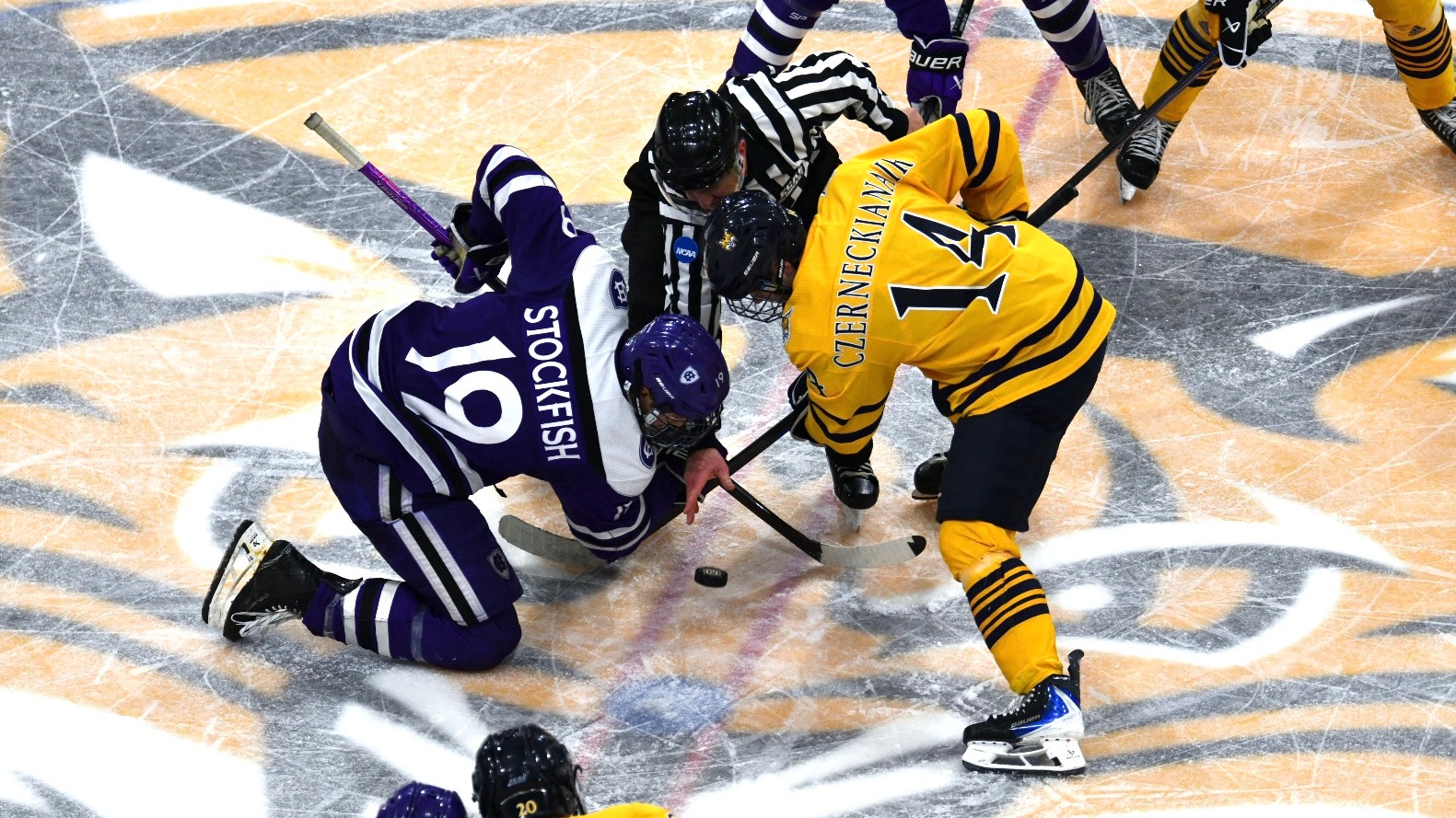 Jack Stockfish takes a faceoff vs Quinnipiac