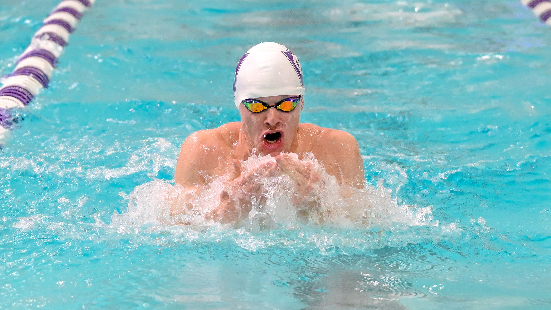Zach Bubonovich swimming against Boston University.