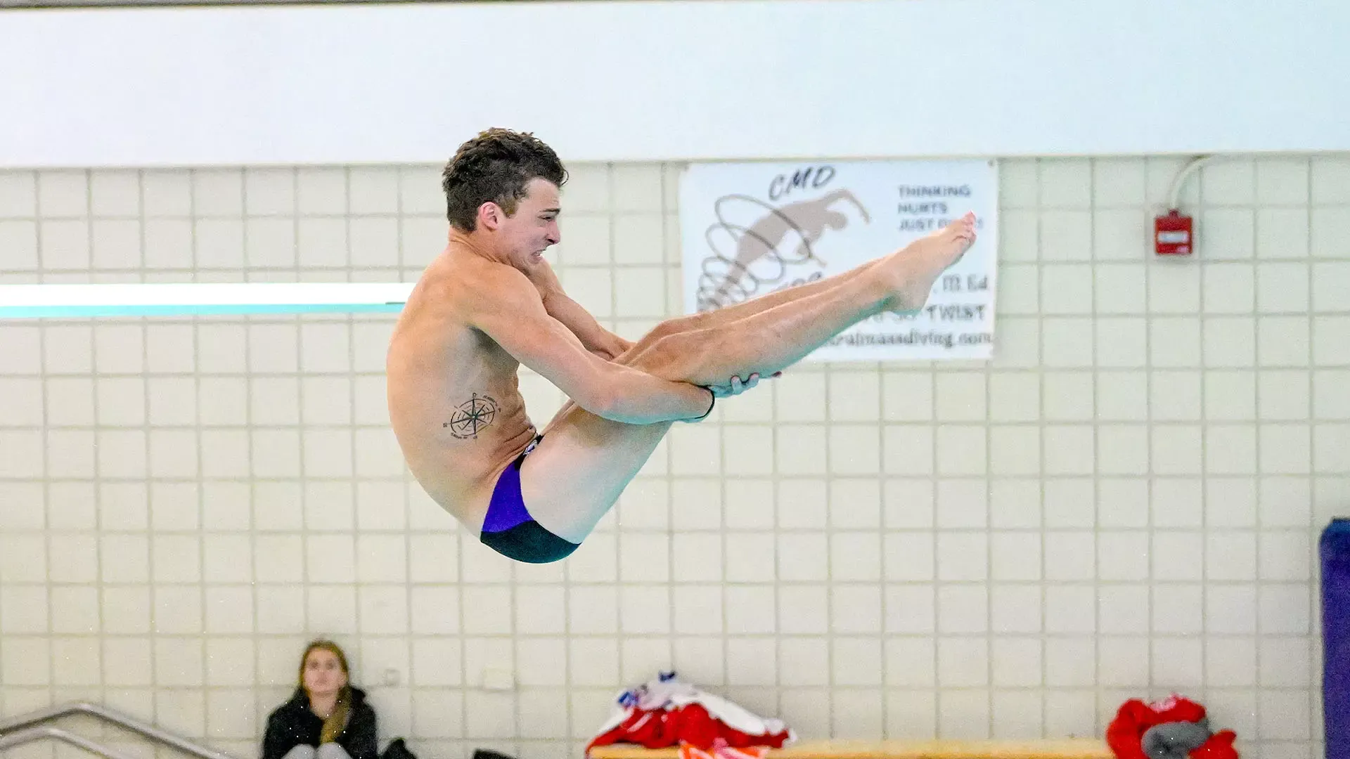 Griffin Casey diving against Boston University.