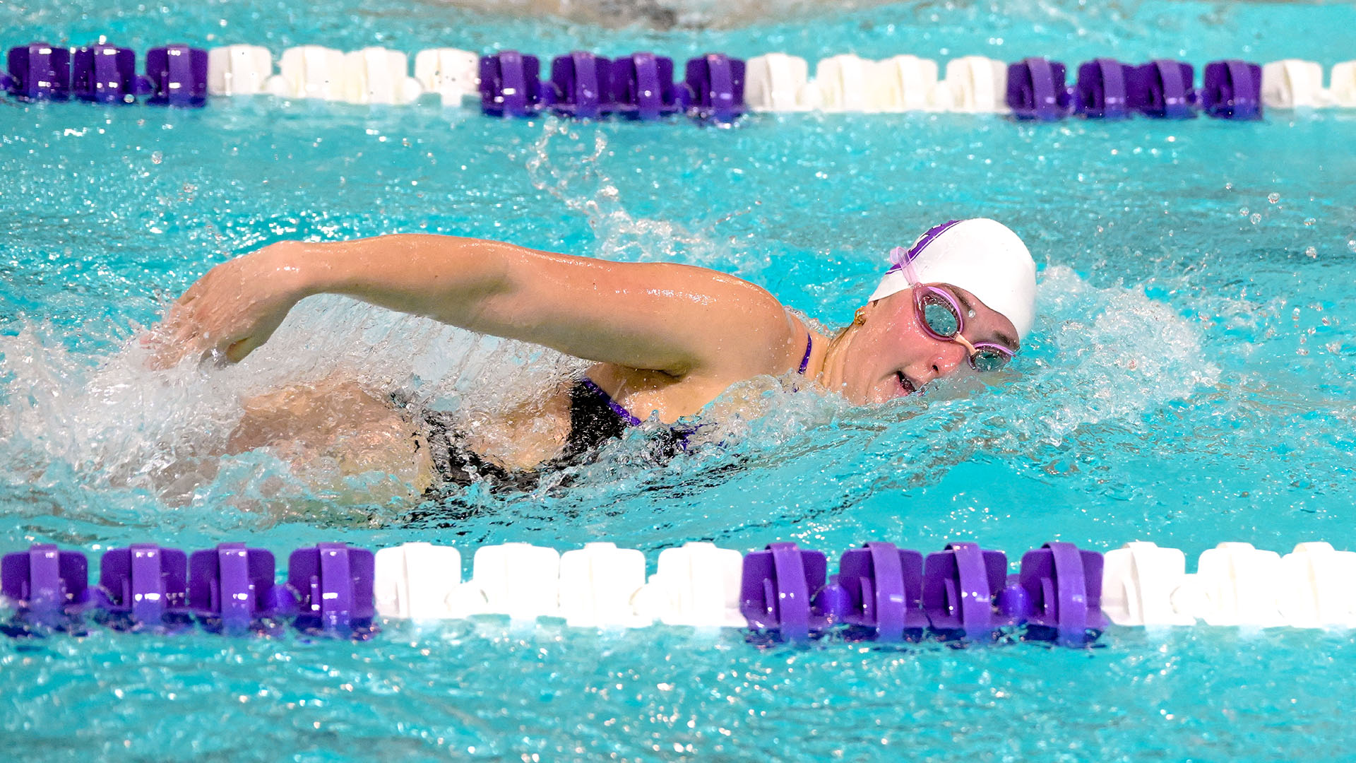 Ainsley Nalen swimming against Boston University.