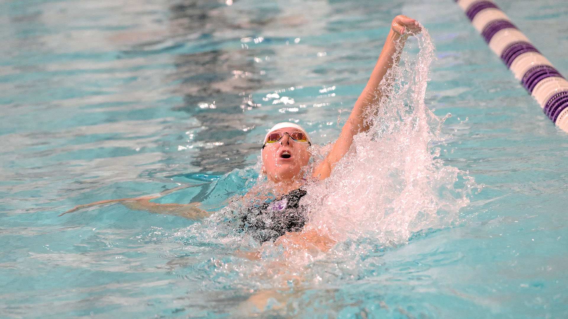 Ellie Reinhart swimming against Boston University.