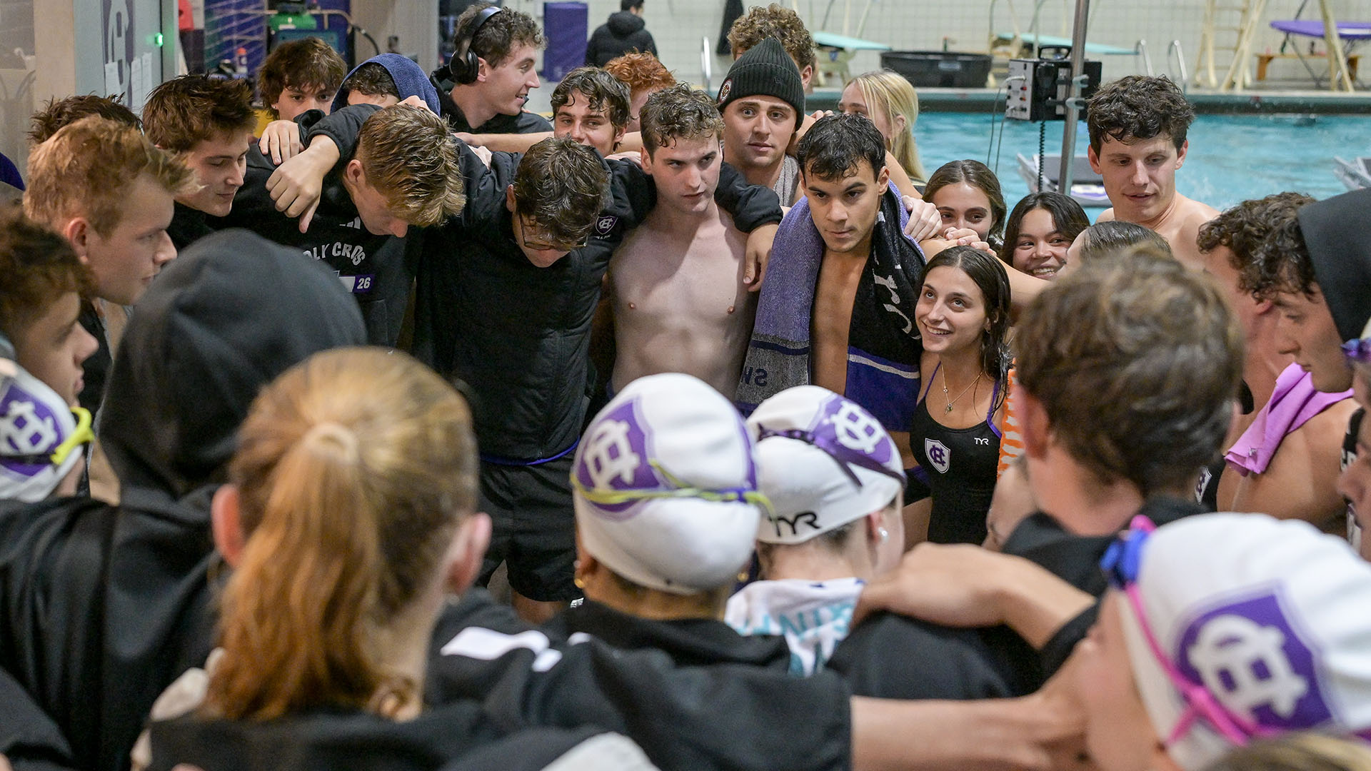 The Crusaders huddle prior to their meet with Boston University.
