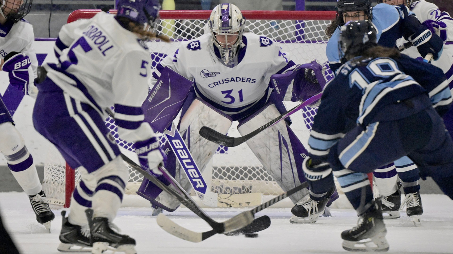 Abby Hornung in net against Maine