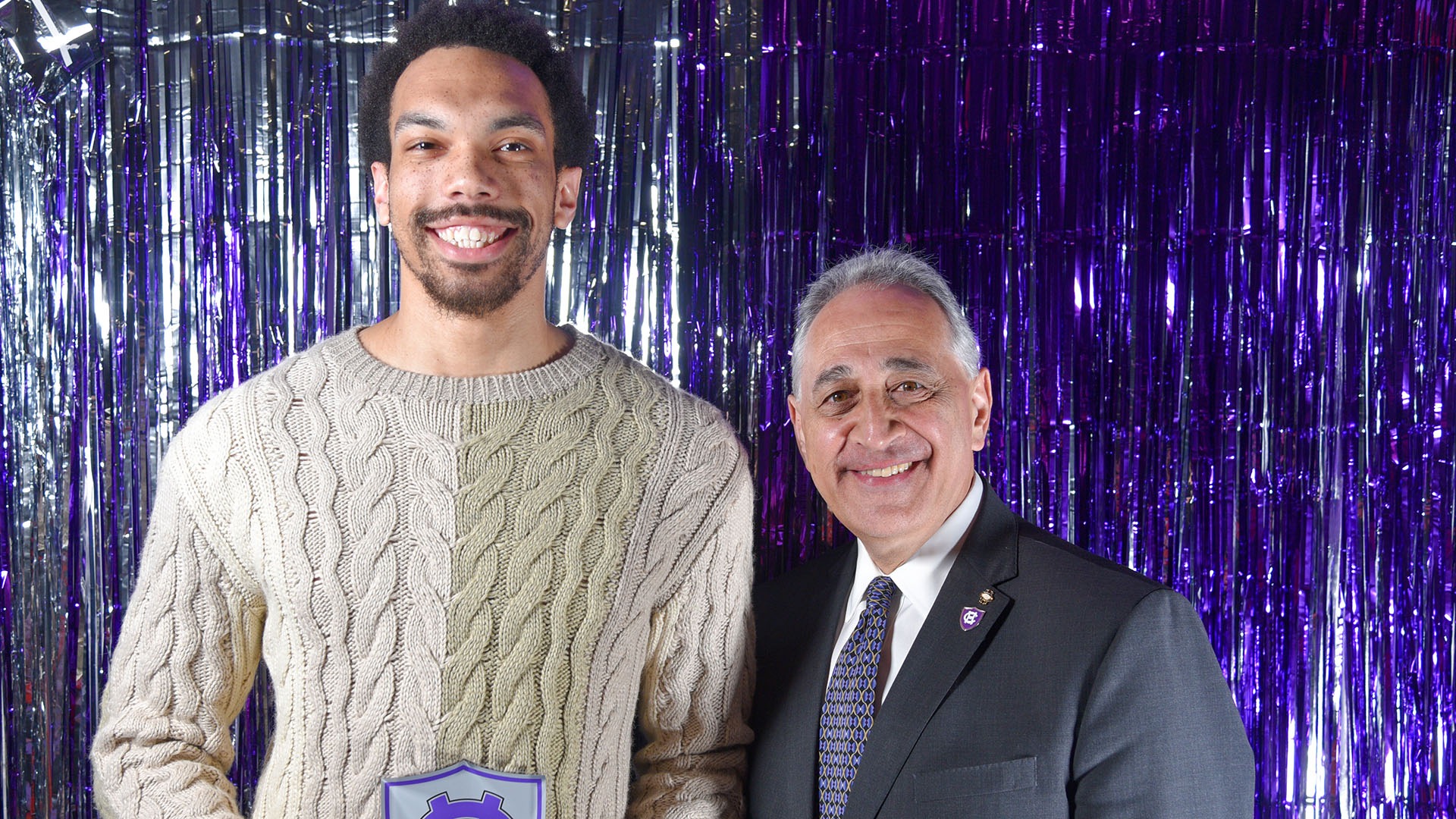 Caleb Kenney receiving the Cooney Award