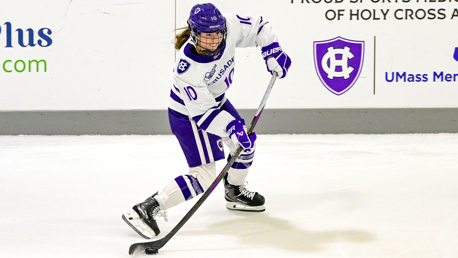 Lulu Rourke with the puck against RPI.