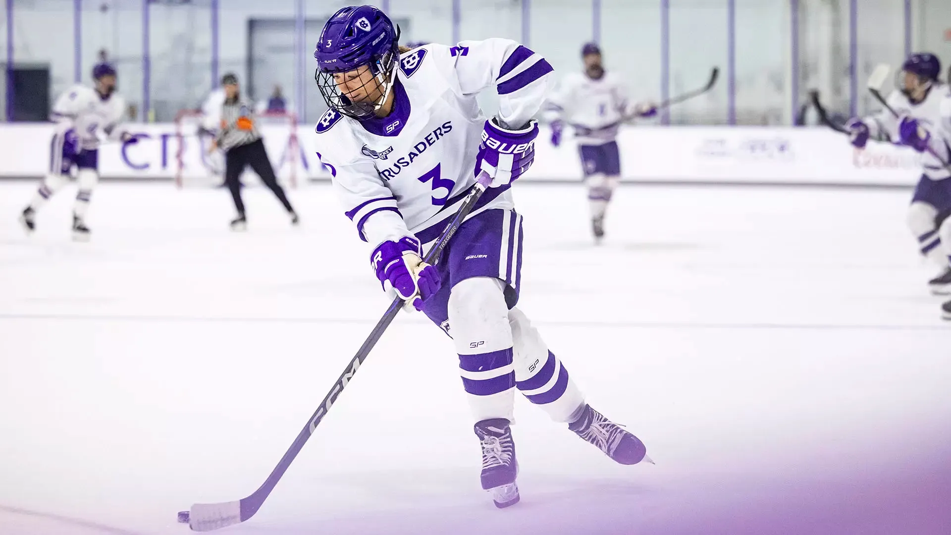 Abby Garvin with the puck against RPI.