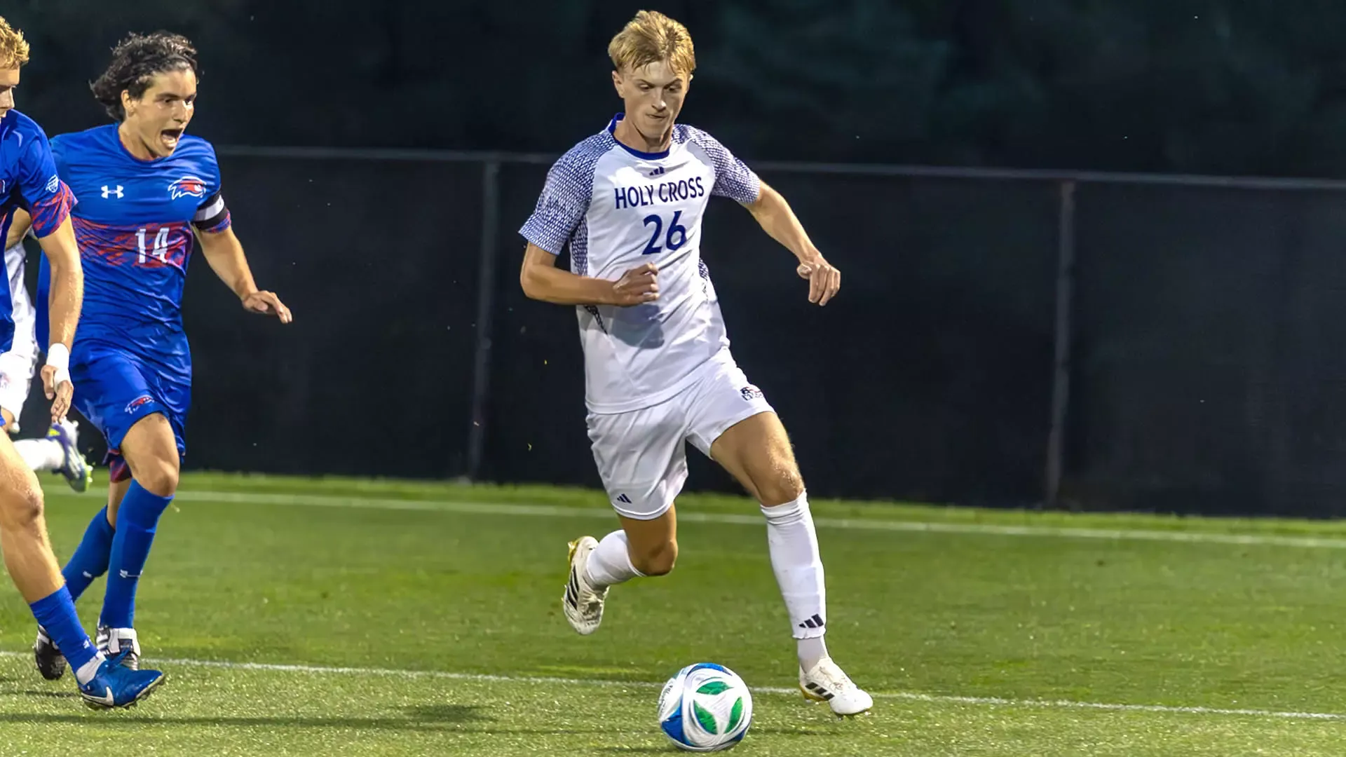 Jack Fiedler with the ball against UMass Lowell.