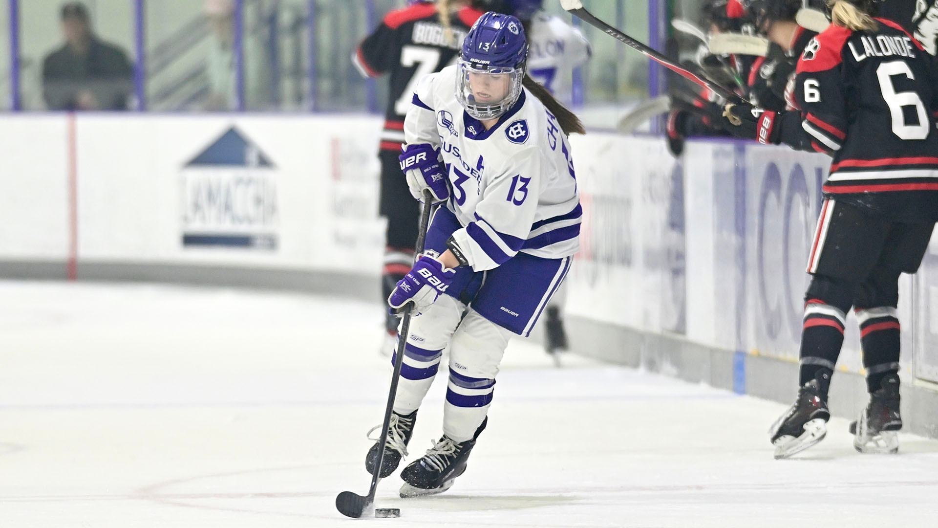 Reghan Chadwick with the puck against Northeastern