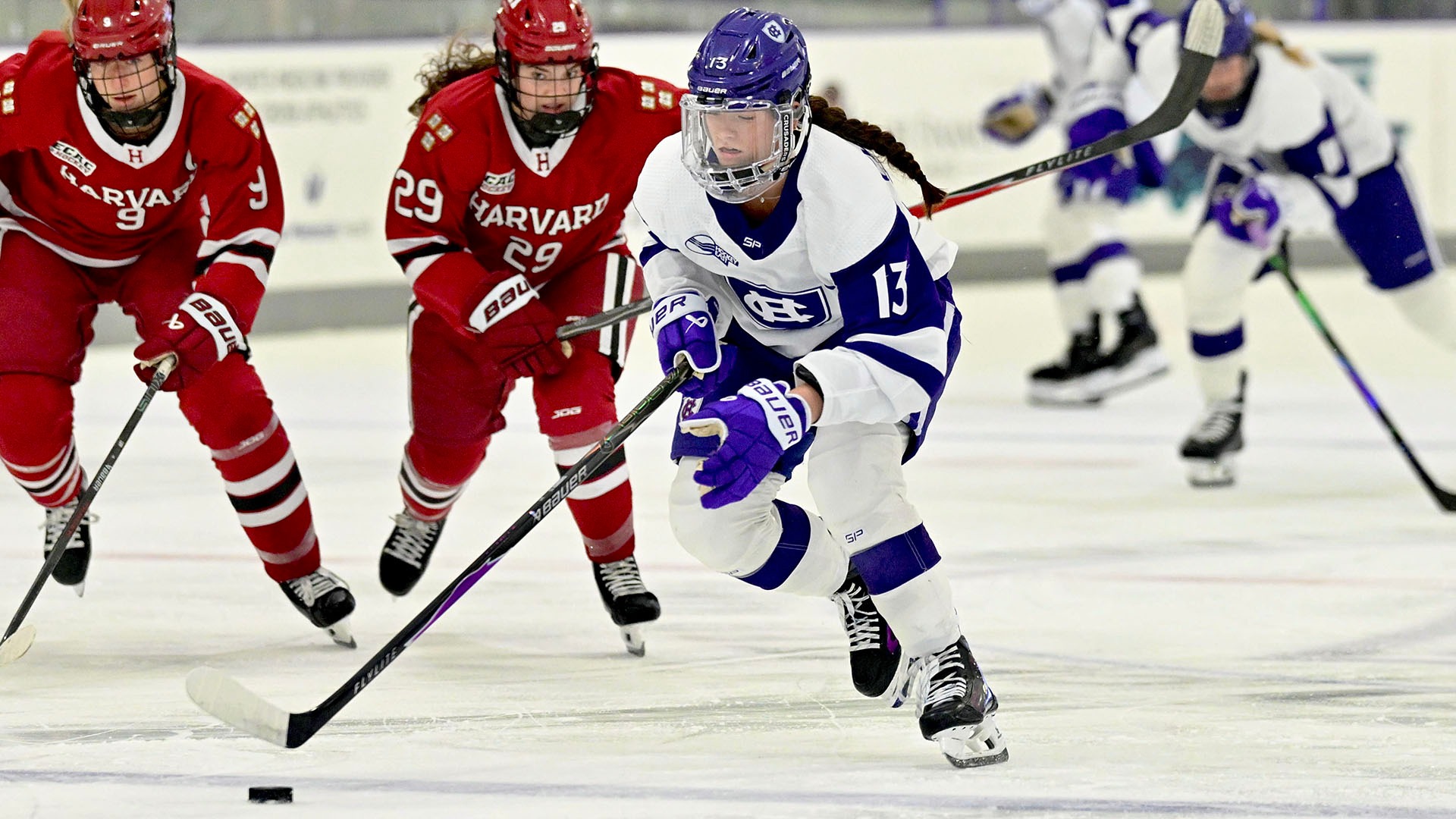 Reghan Chadwick with the puck against Harvard