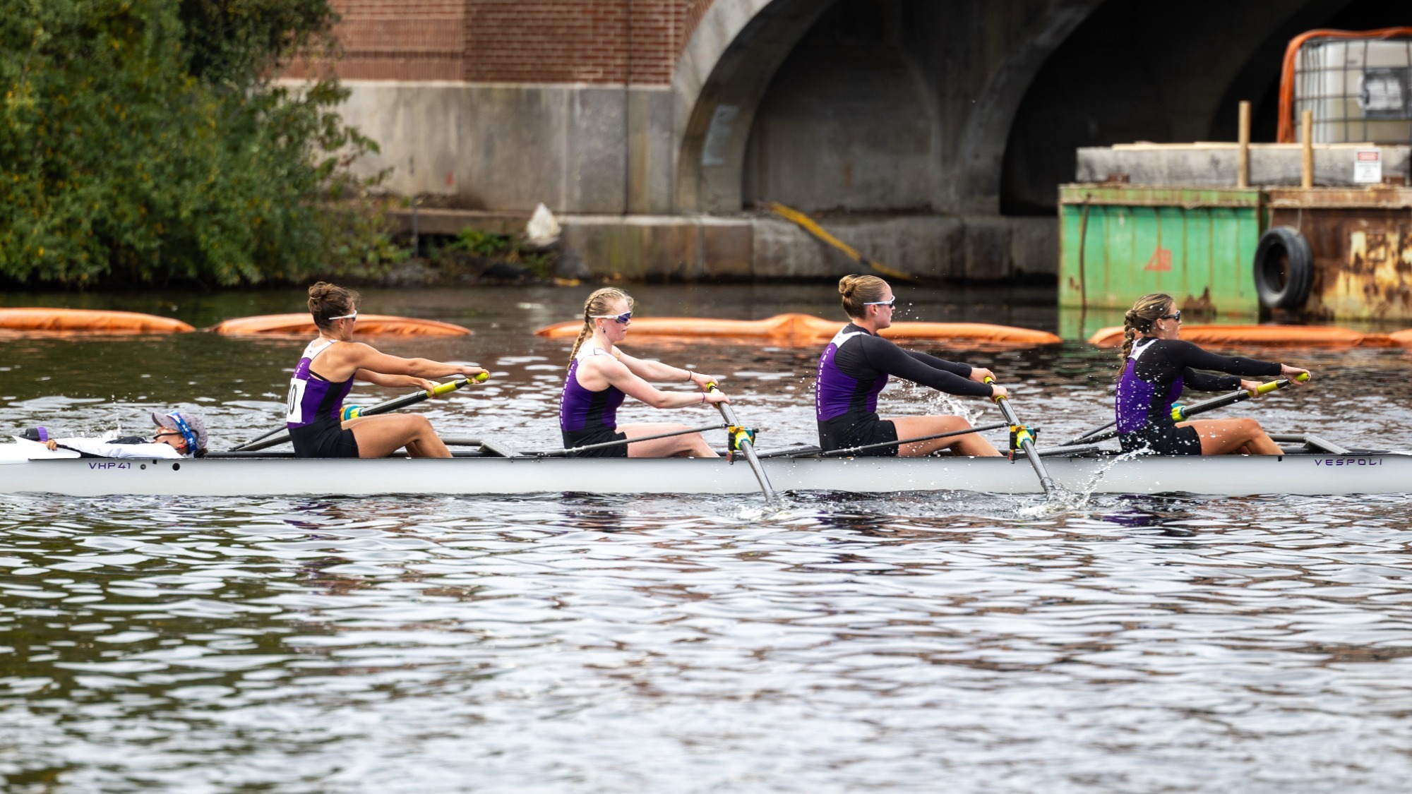 Holy Cross women's rowing varsity 4+ competes at the Head of the Charles