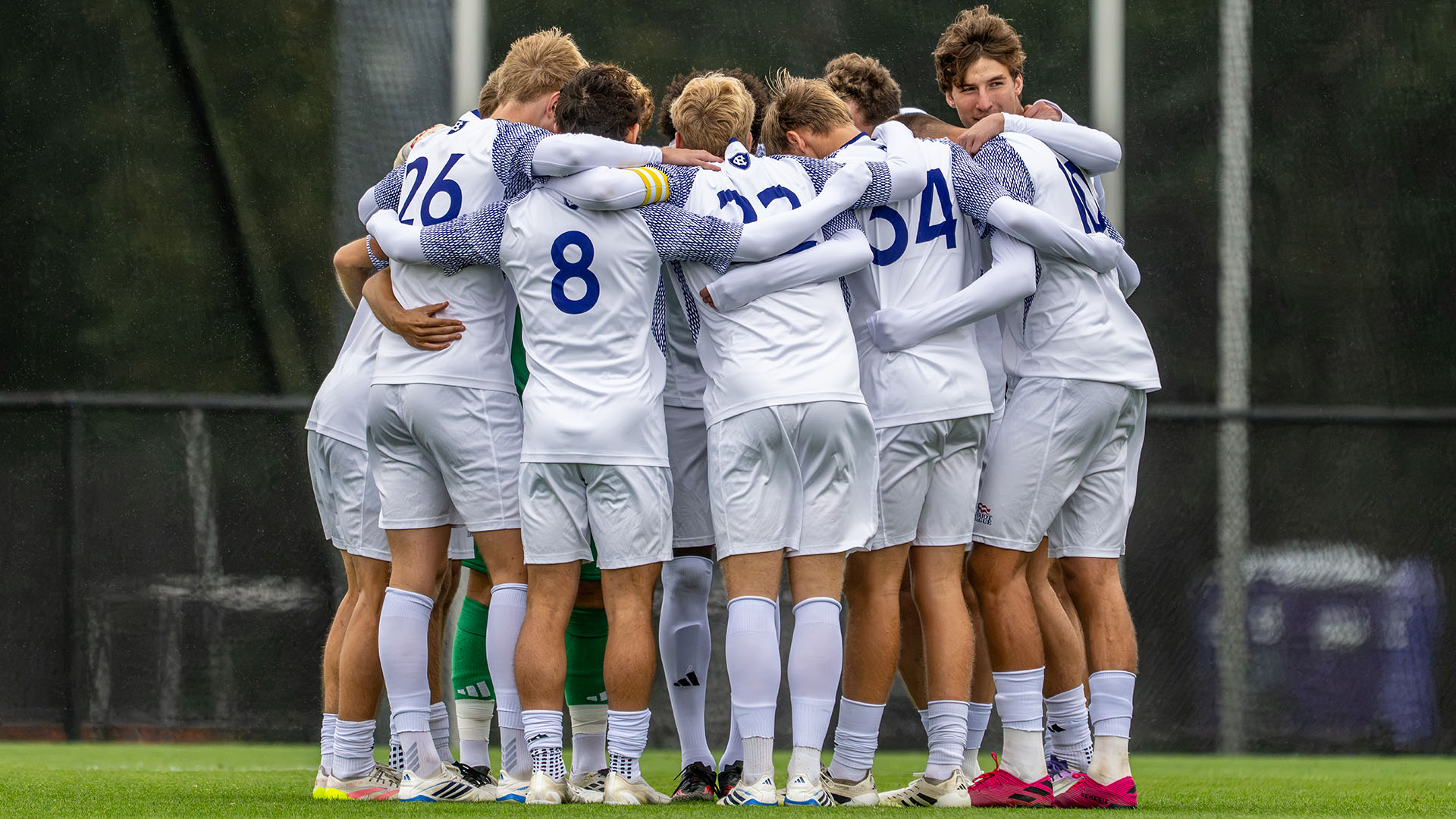 The Crusaders huddle during their game against Loyola