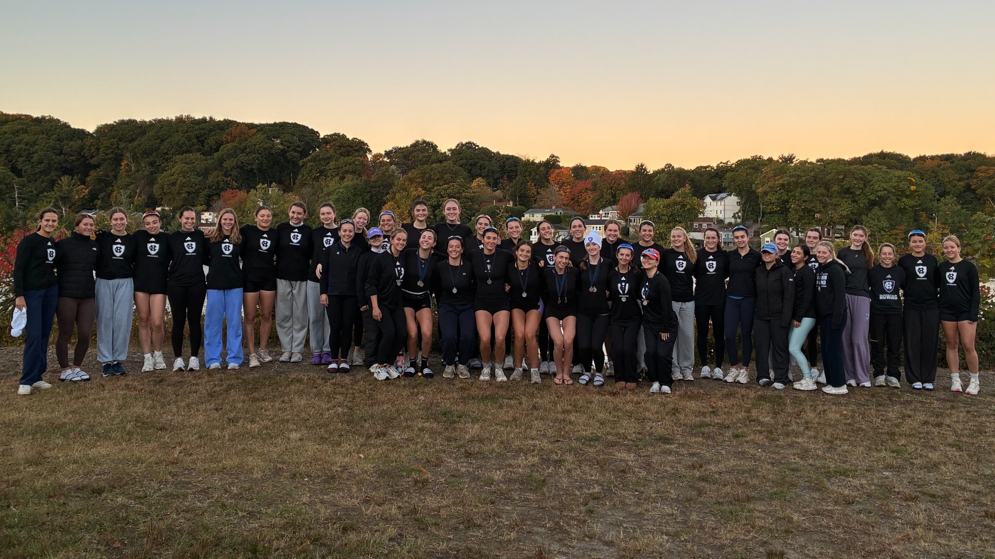 Women's rowing with their Head of the Riverfront medals