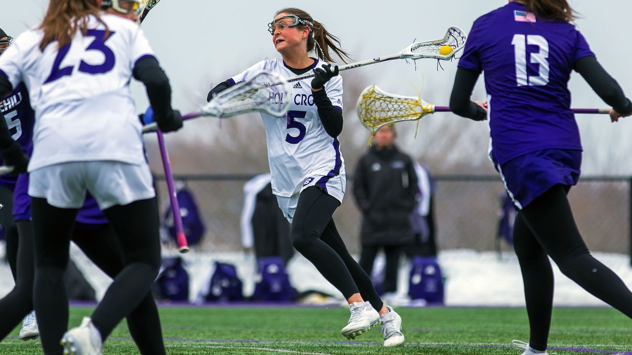 Molly Fink taking a shot against Stonehill