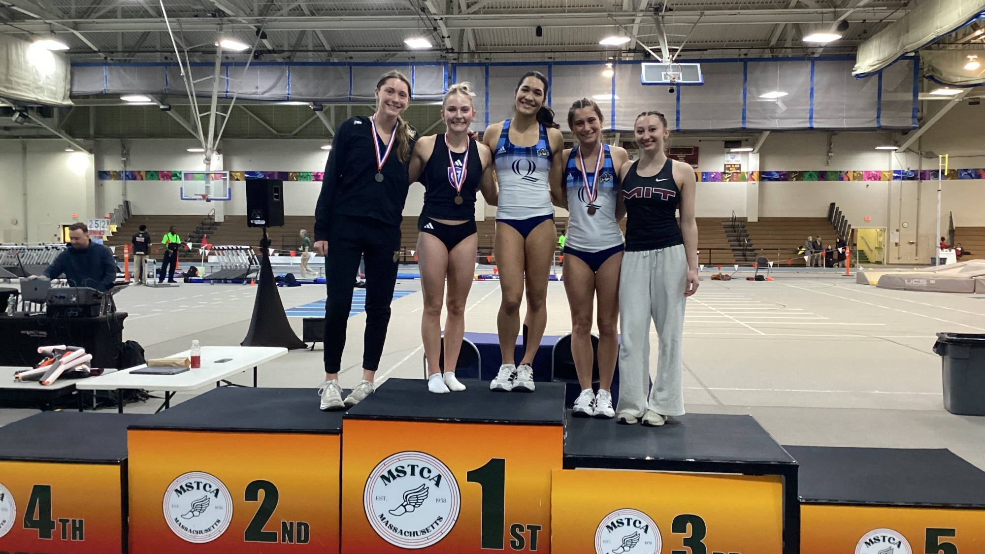 Bridget Sachs on Podium at NEICAAA