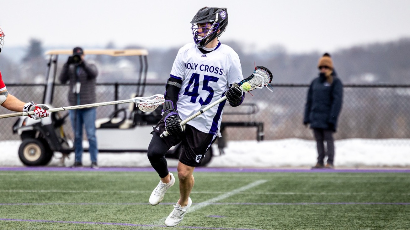 Owen Tunney runs with the ball against Sacred Heart