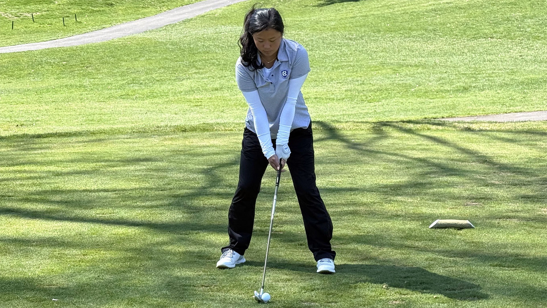 Julianna Megan teeing off at the Patriot League Championship