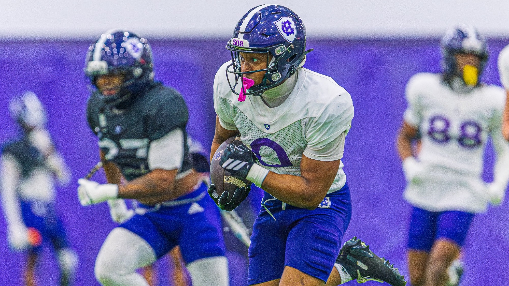 Jojo Williams running the ball during spring practice