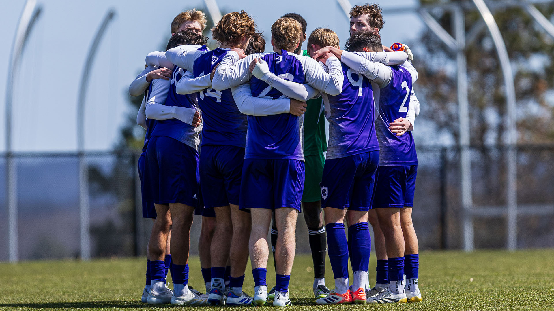 The Crusaders huddle during their game against Rhode Island.