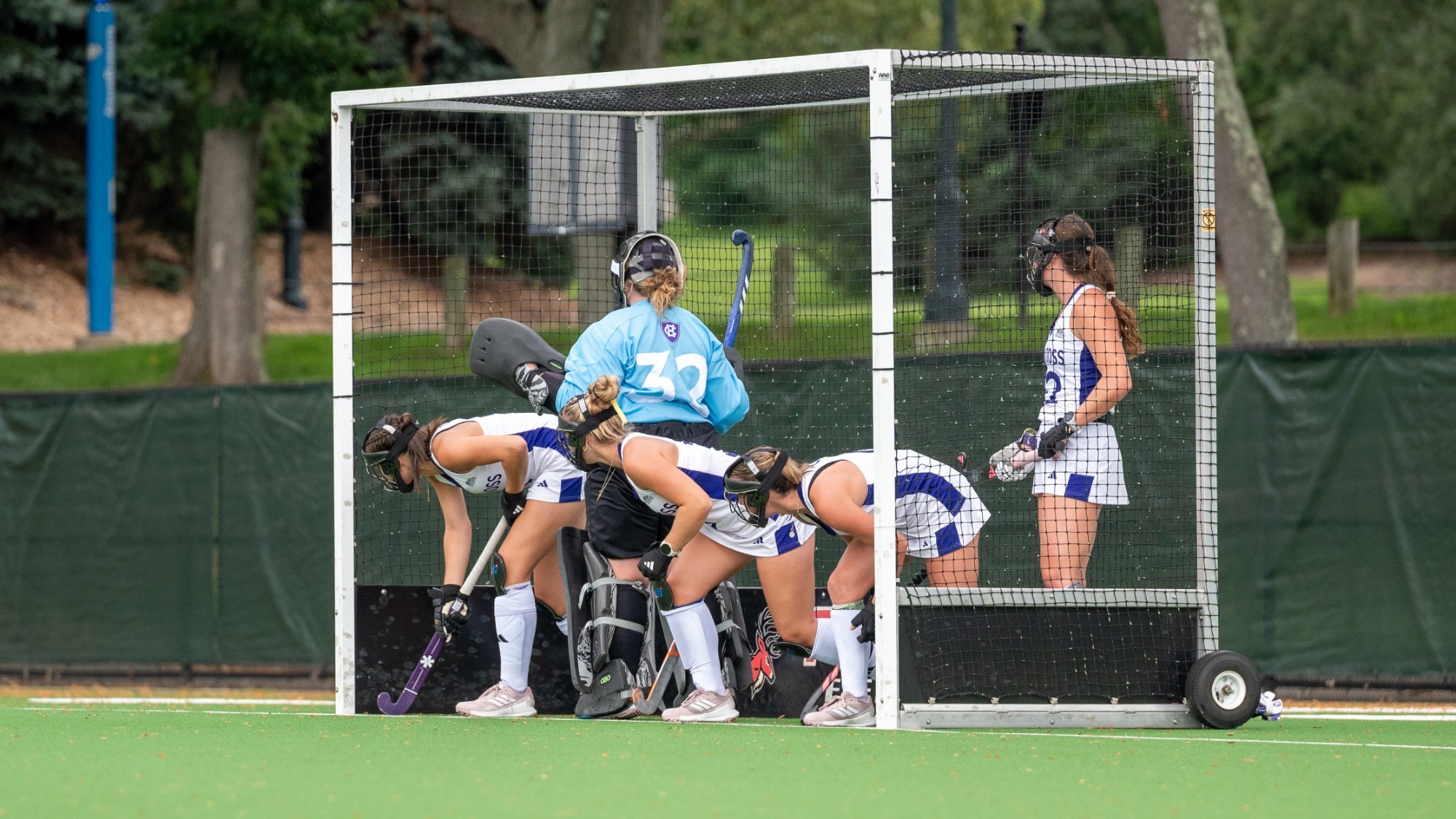 Field Hockey sets up for a corner