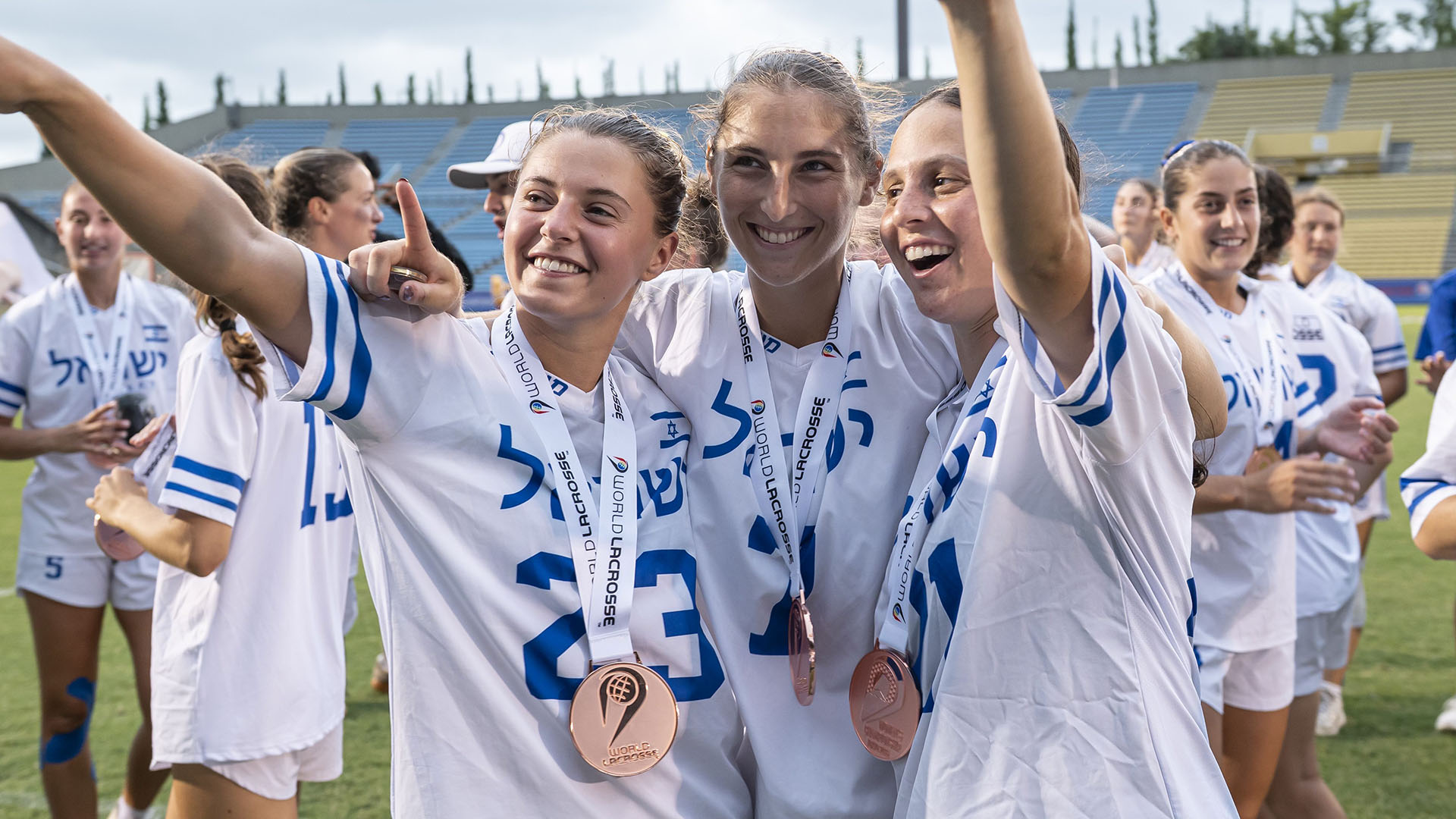 Racheli Levy-Smith celebrates with her teammates after winning the bronze medal at the 2026 World Lacrosse Women's Championship