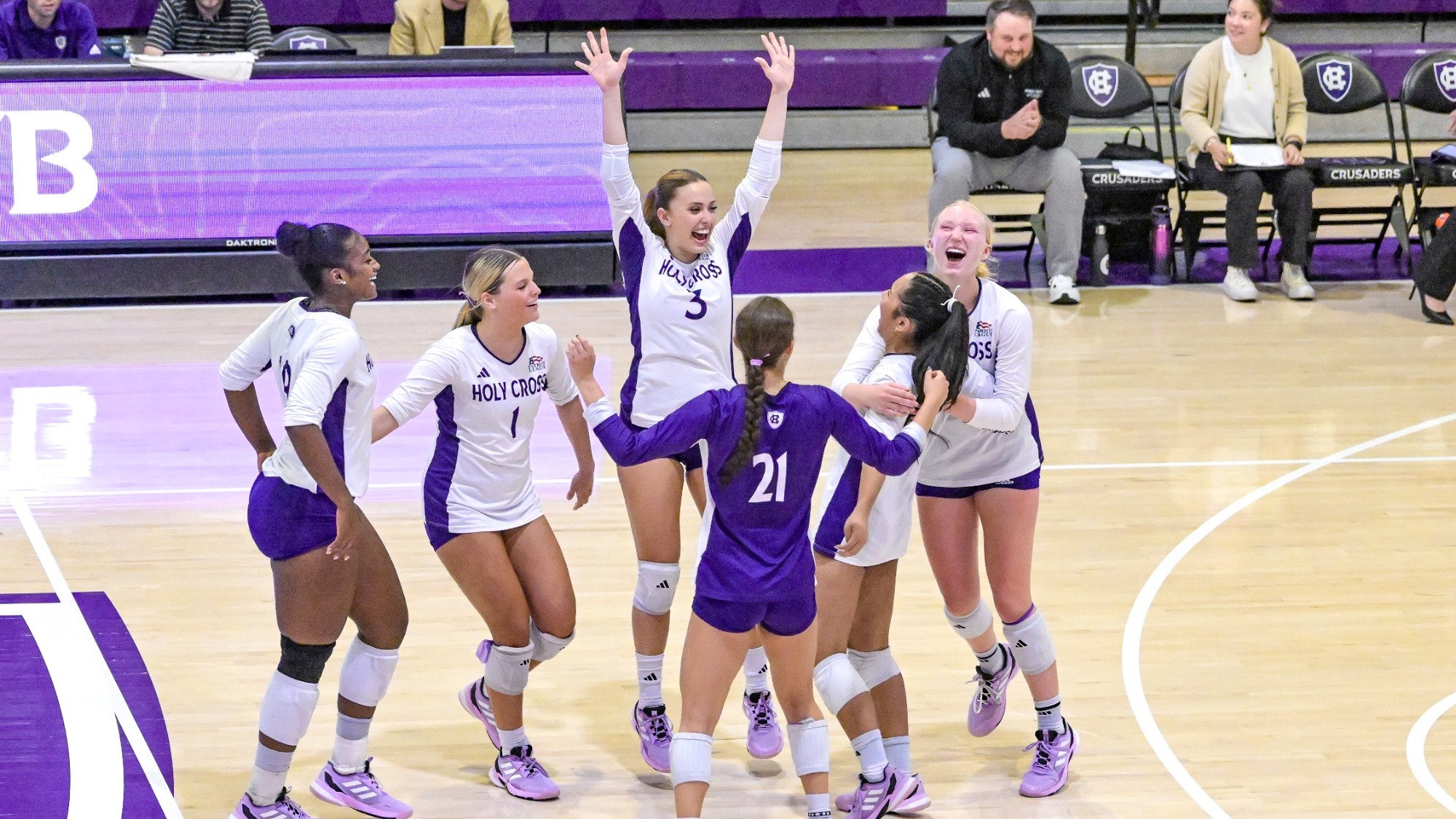Holy Cross volleyball celebration