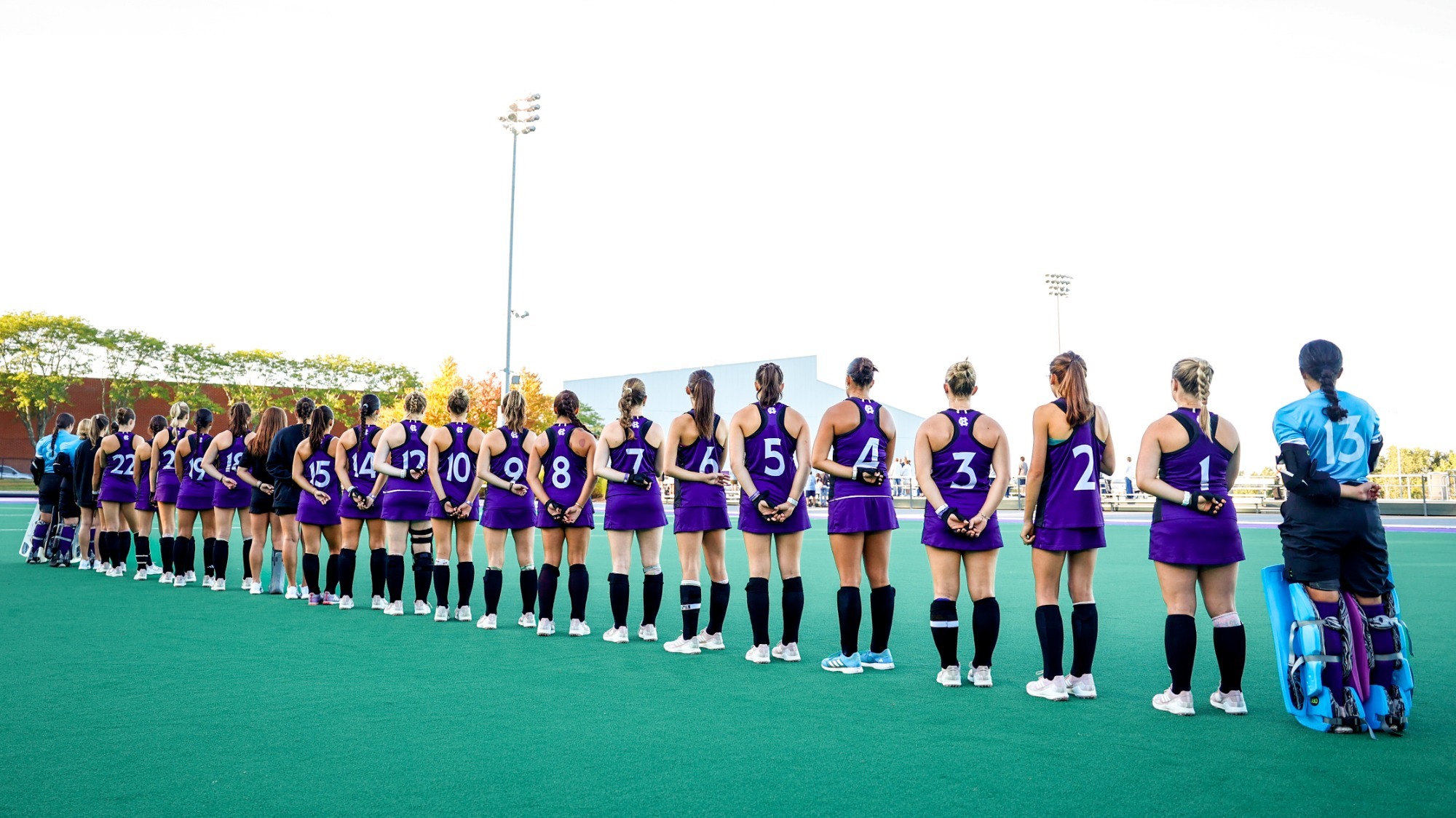 Holy Cross lines up for the anthem