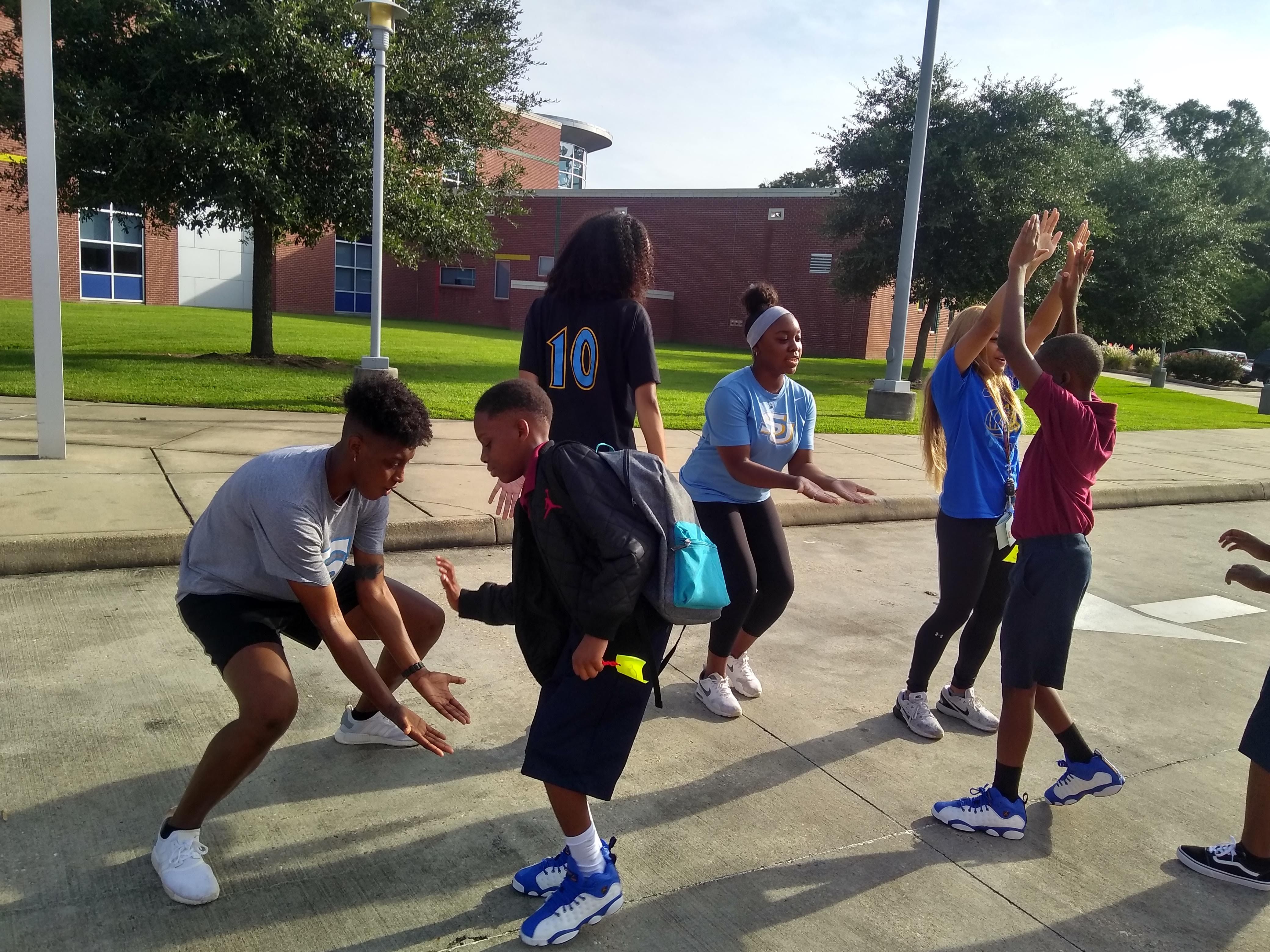 Southern student-athlete welcome back EBR students
