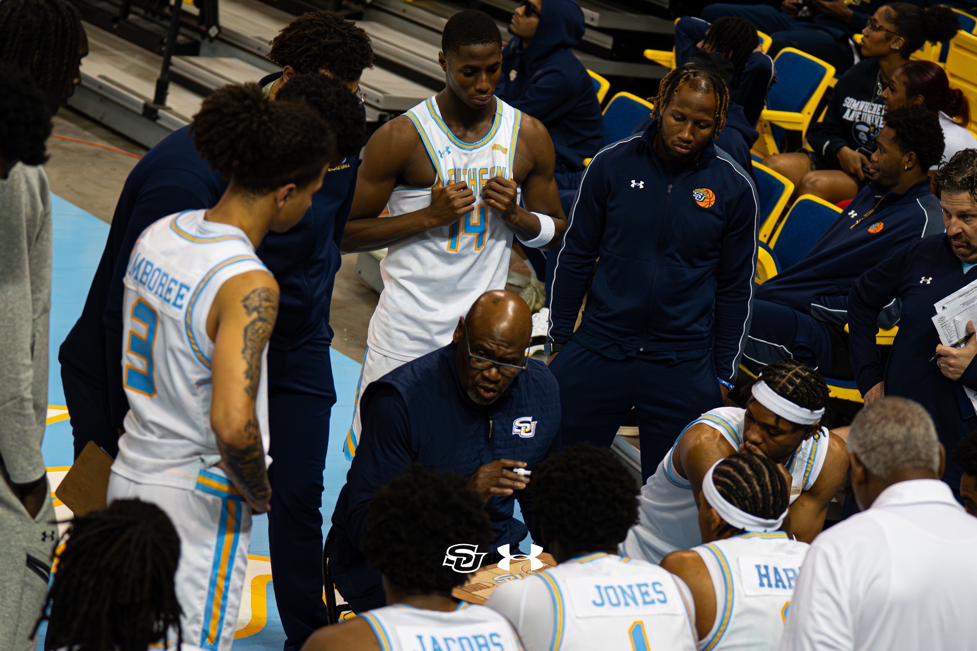 25-26 Men's Basketball Huddle in game