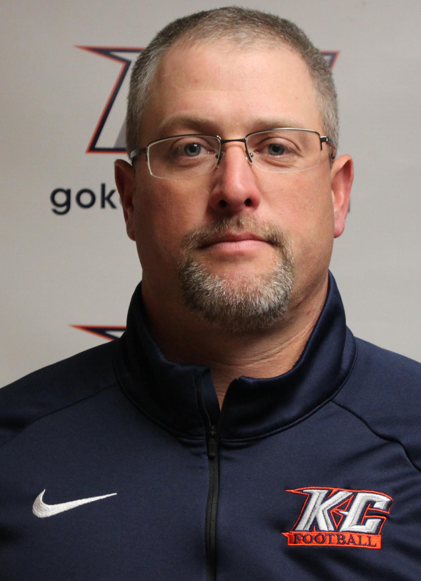 Coach justin higgins