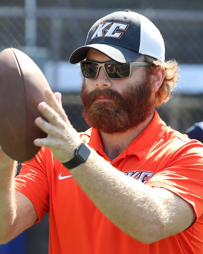 Coach Austin Maguire