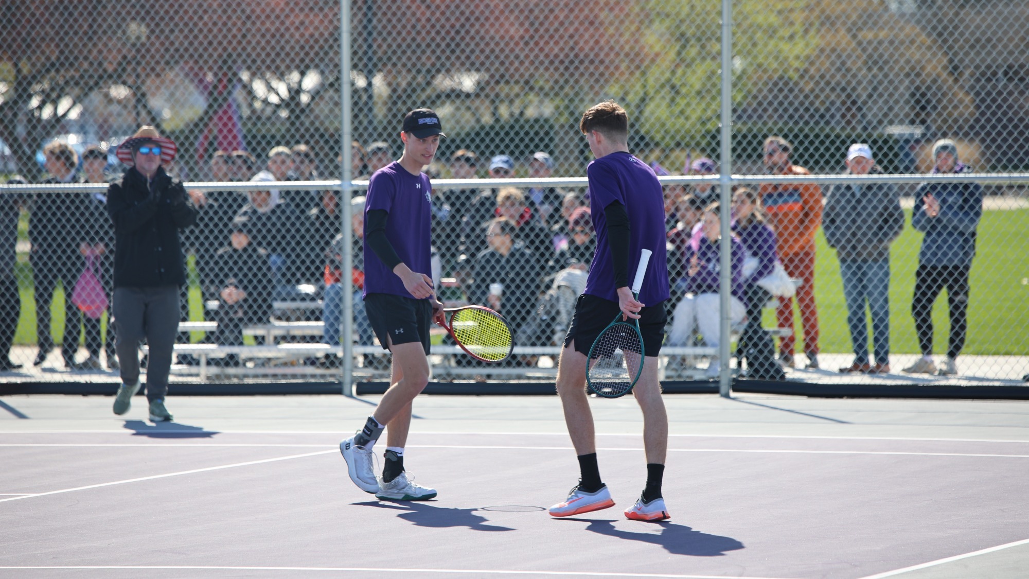 Novak and Stanculov celebrate point