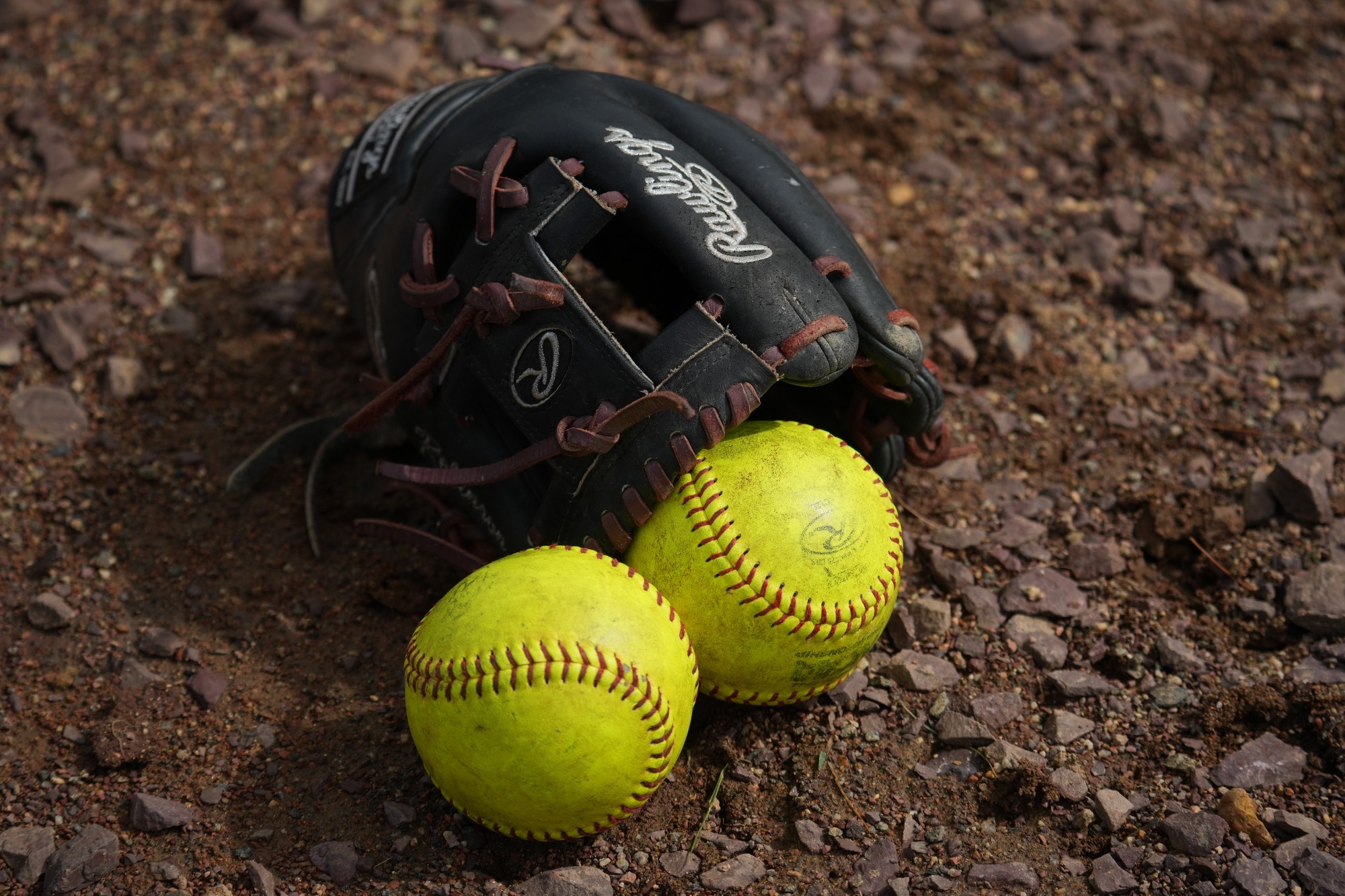 Glove and softball