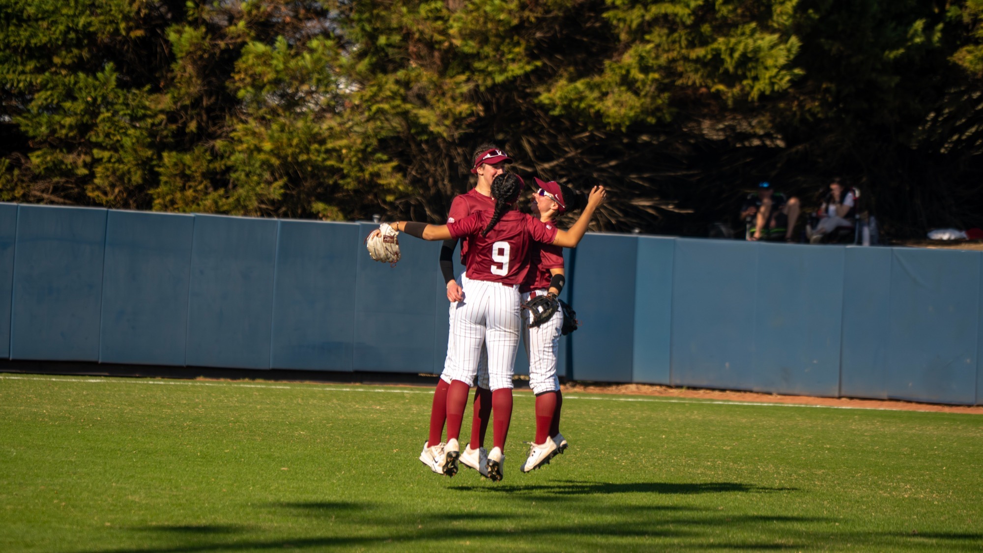 Lafayette softball players celebrating