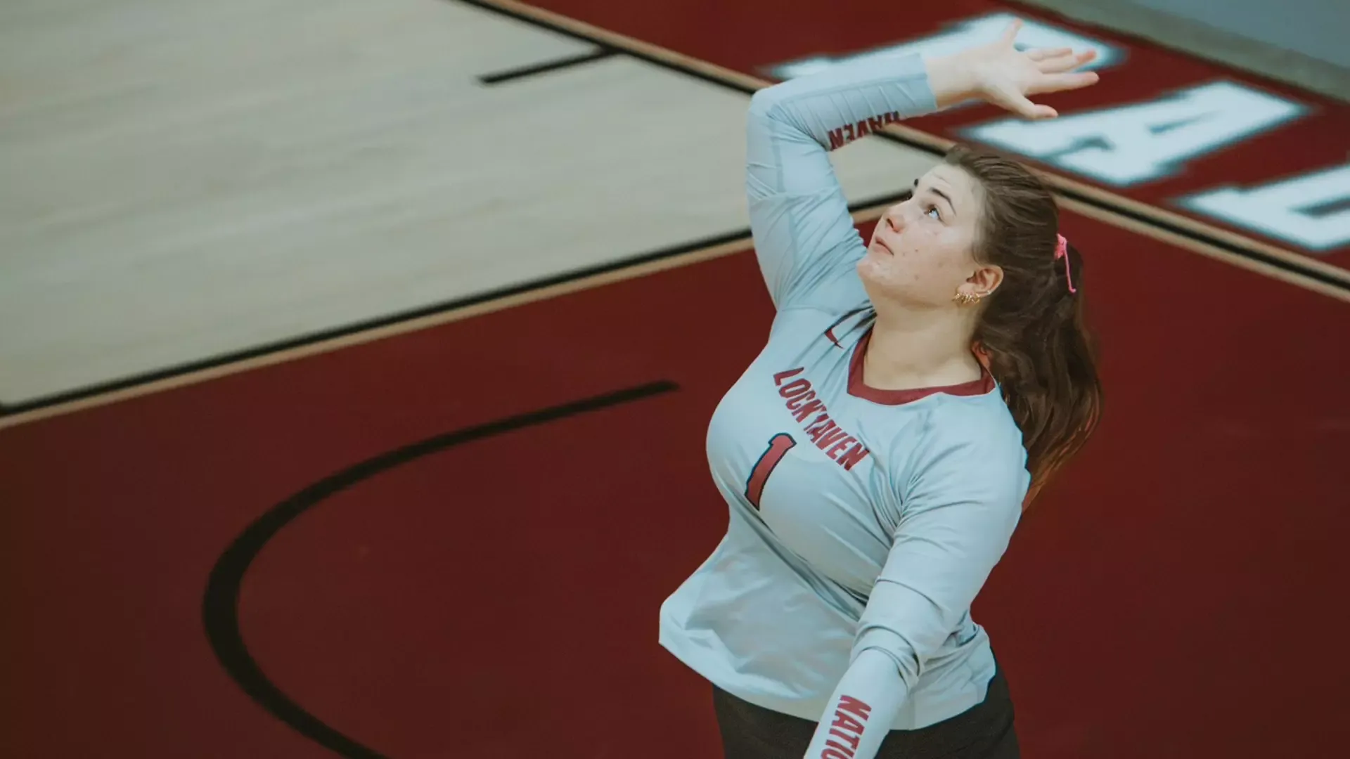 Demi Ross serves for the Bald Eagles
