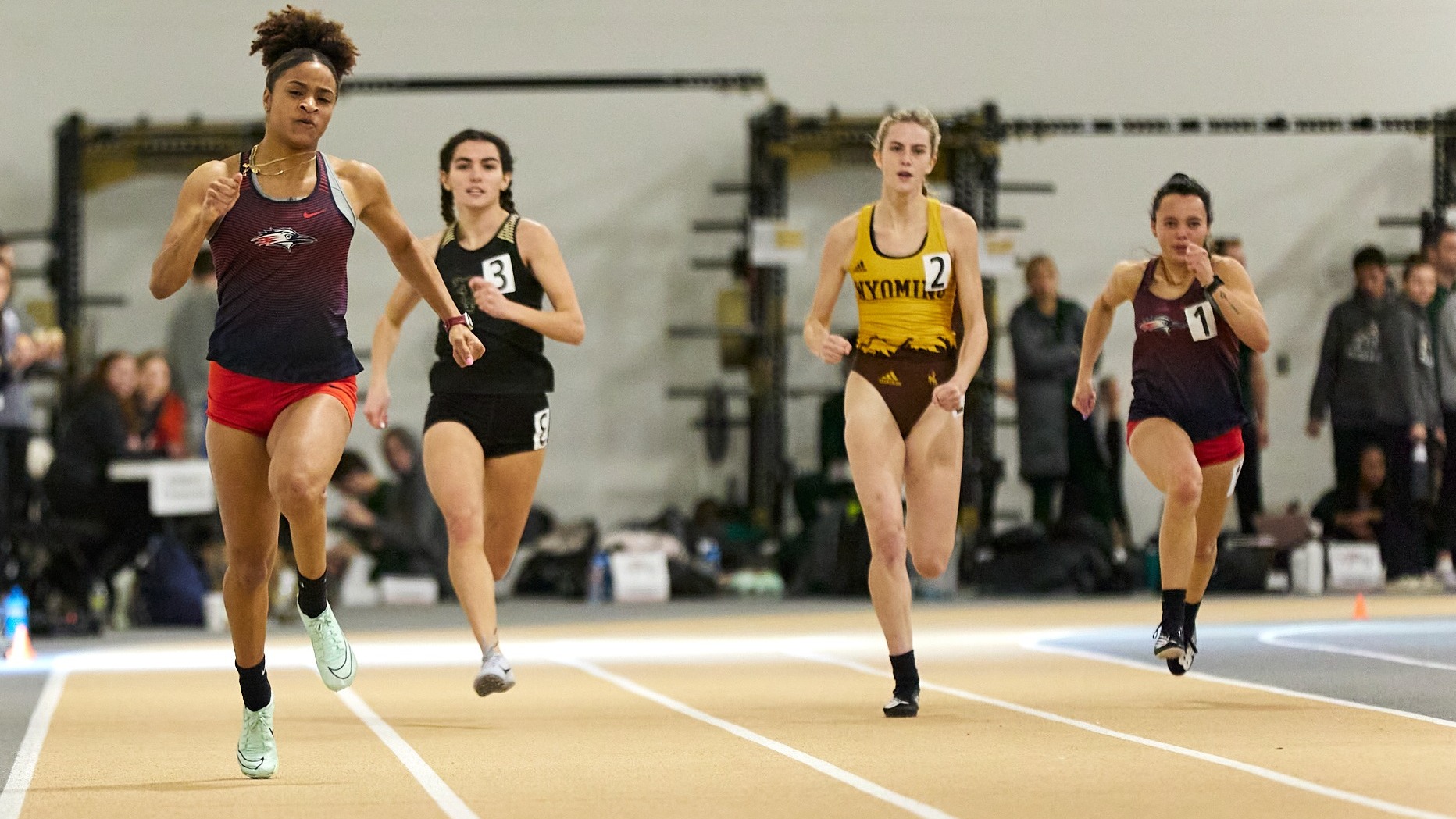 Jaivion Lattimore runs in a track meet on Jan. 21, 2023.