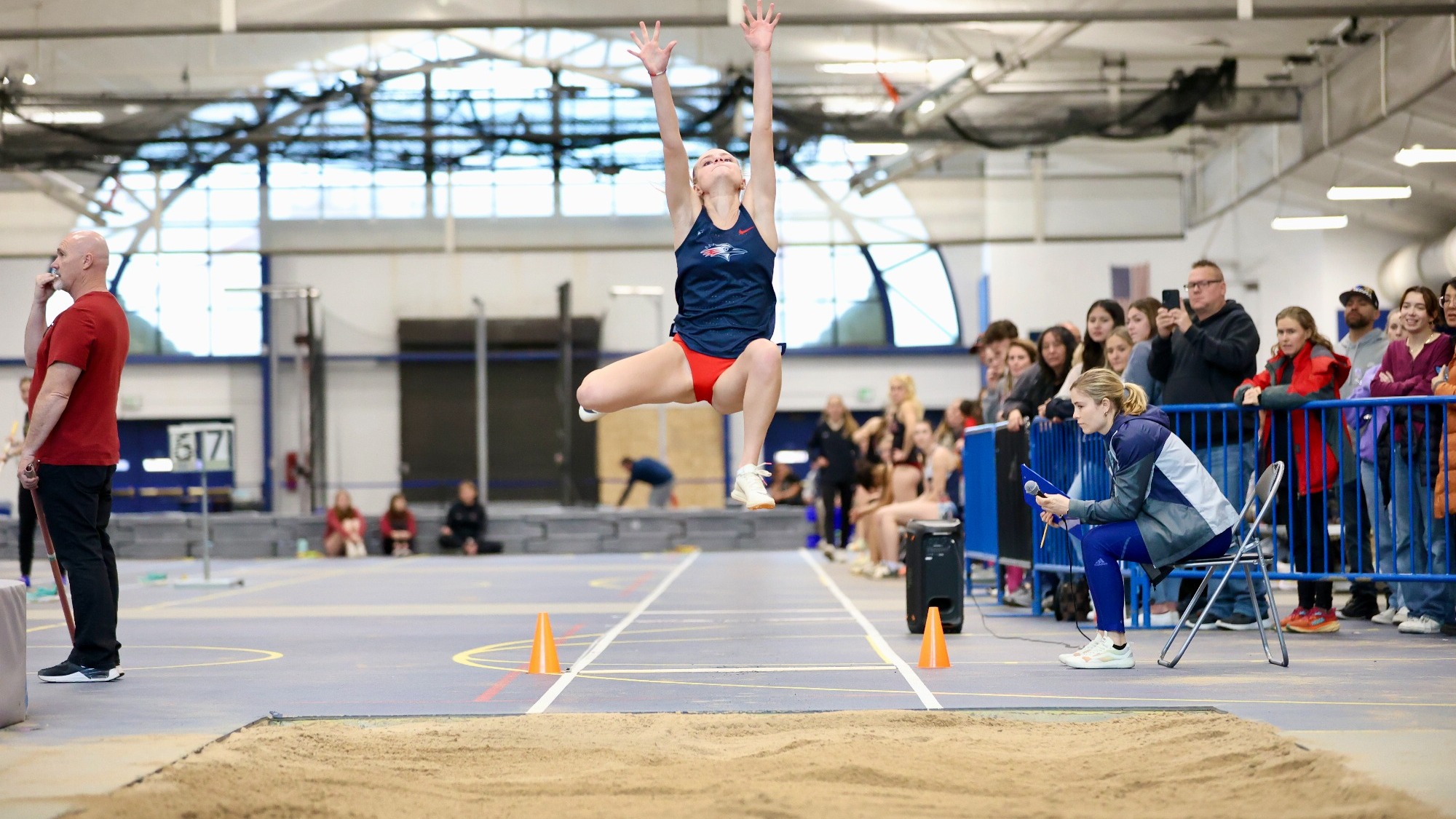 Taylor Weber flies in the long jump on Jan. 26, 2024.