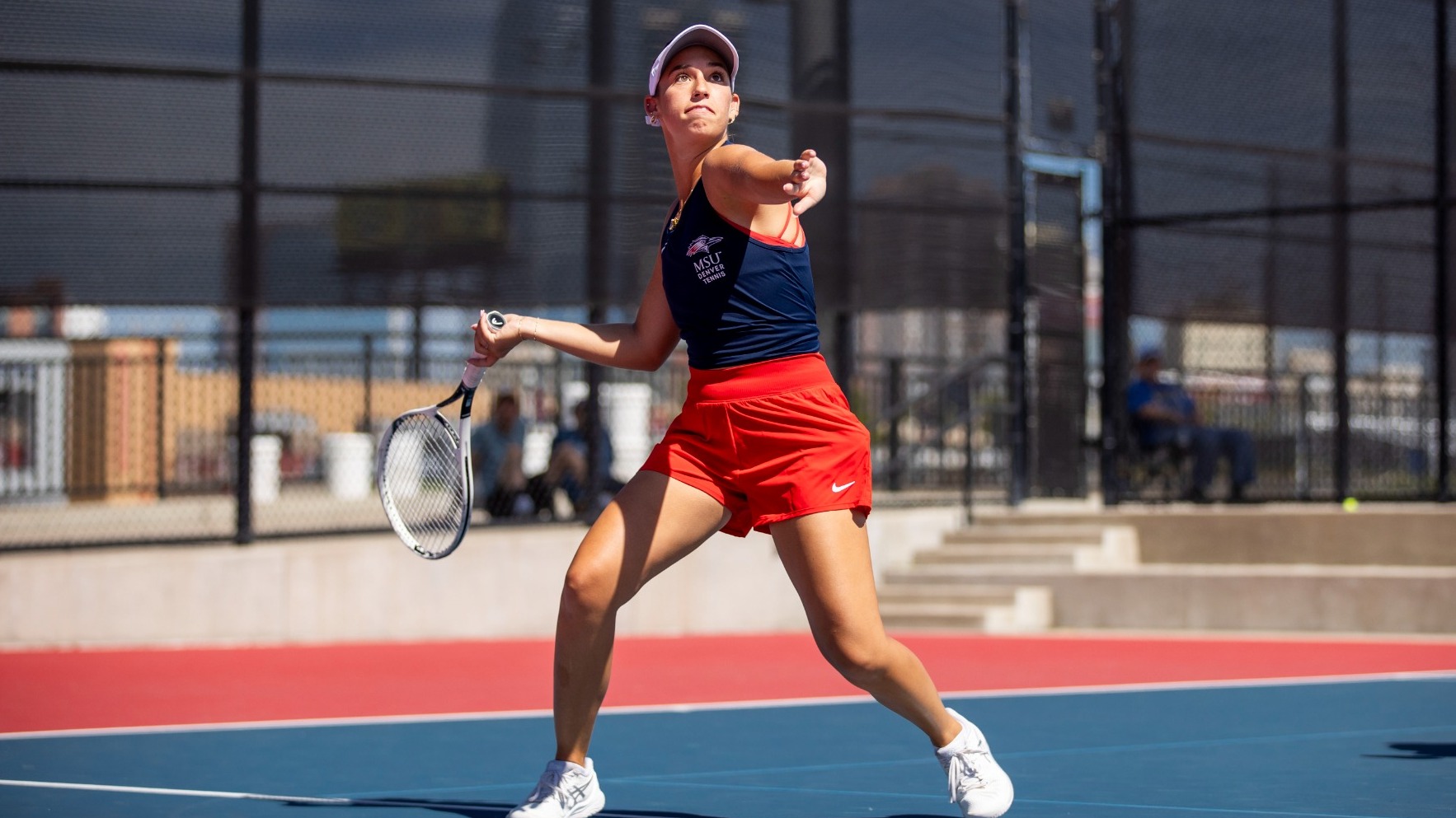 Kambra Roles prepares to hit a forehand against Nebraska-Kearney on Sept. 12, 2024.