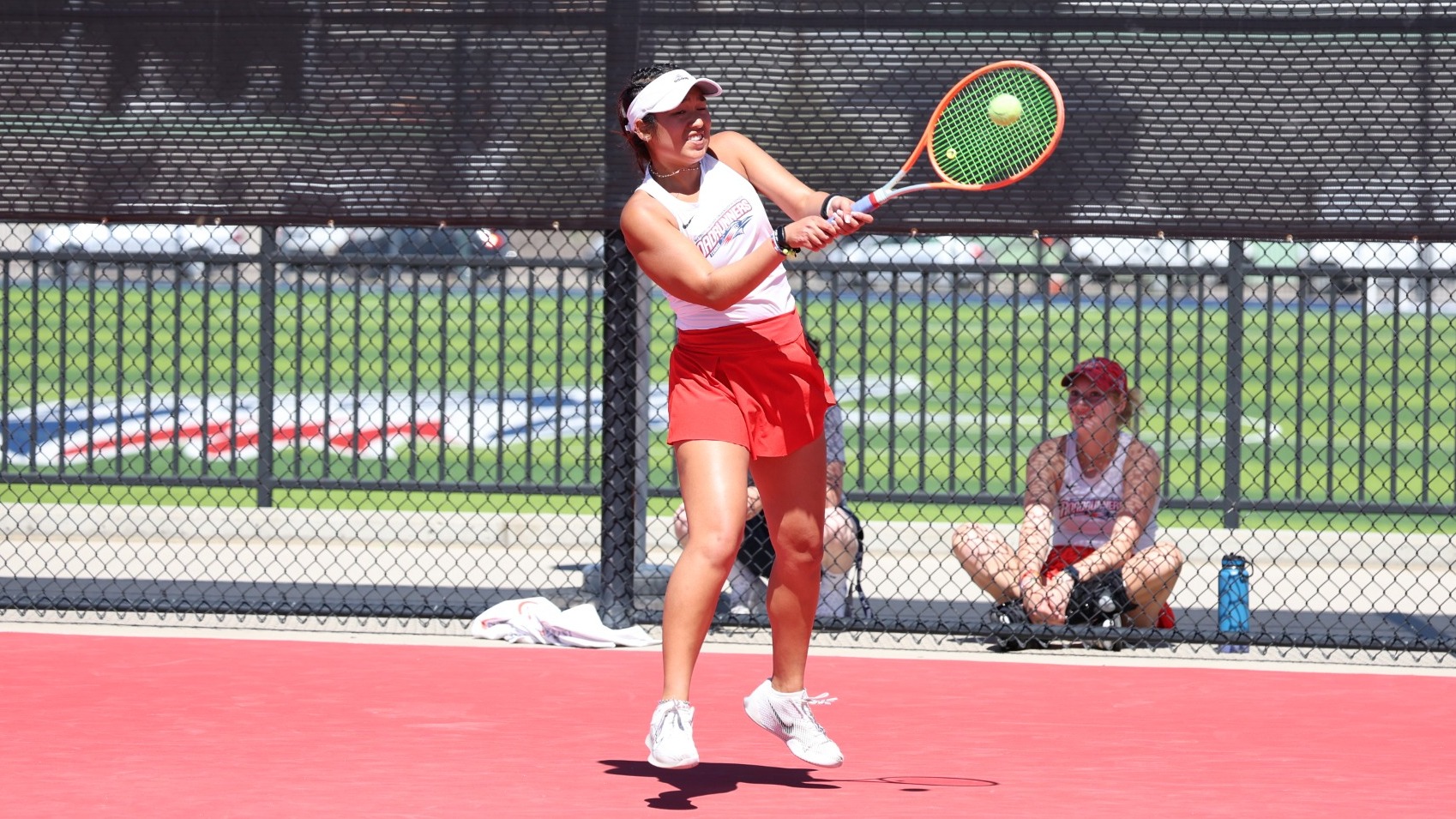 Monica Guarin hits a backhand in a dual against Oral Roberts on April 12, 2024.