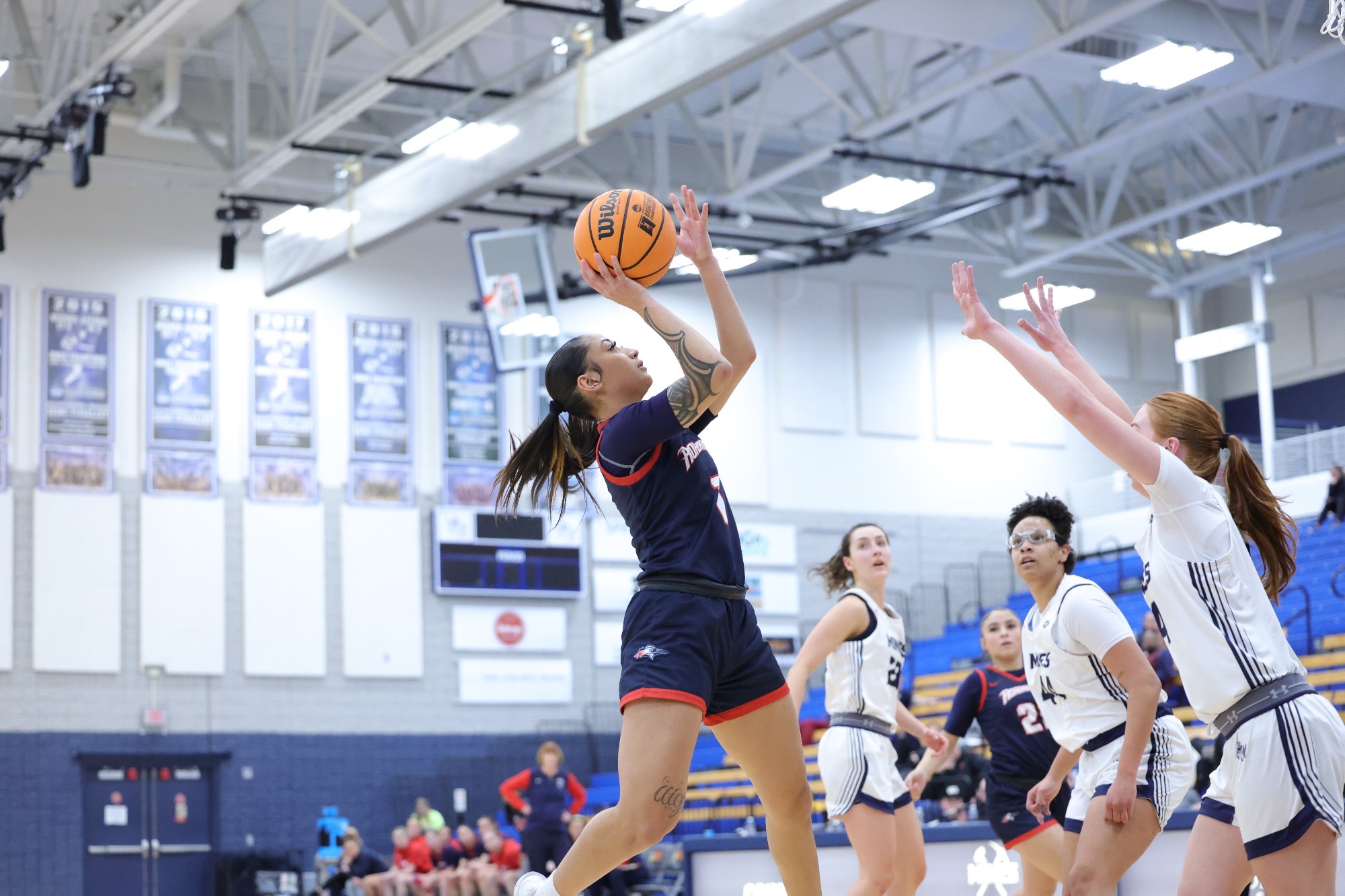 Mikylah Espinosa goes up for jumper against the Orediggers