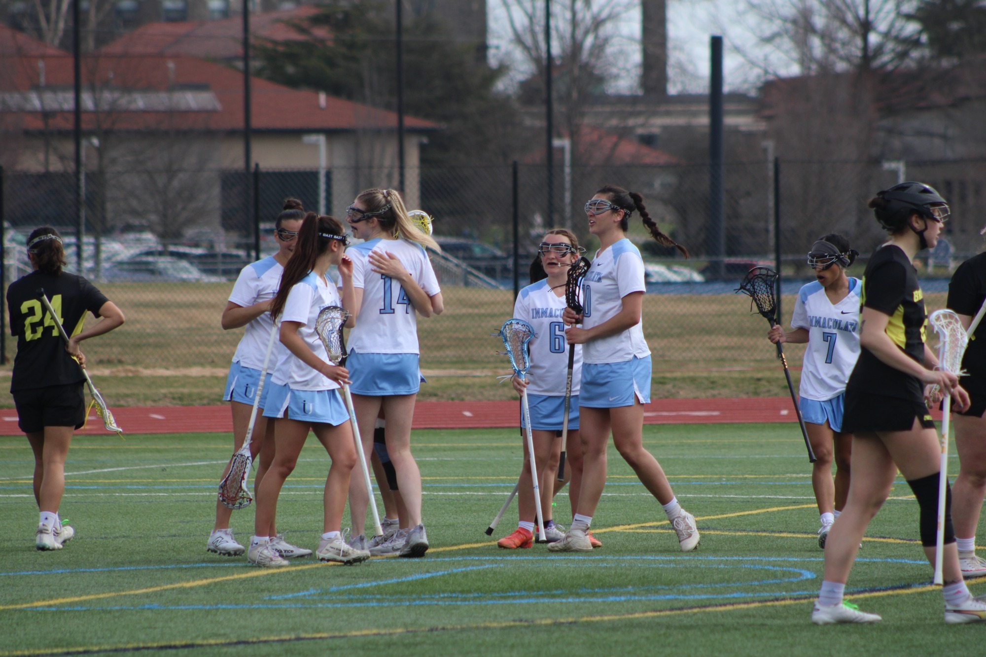 IUWLax 2026 goal cele huddle