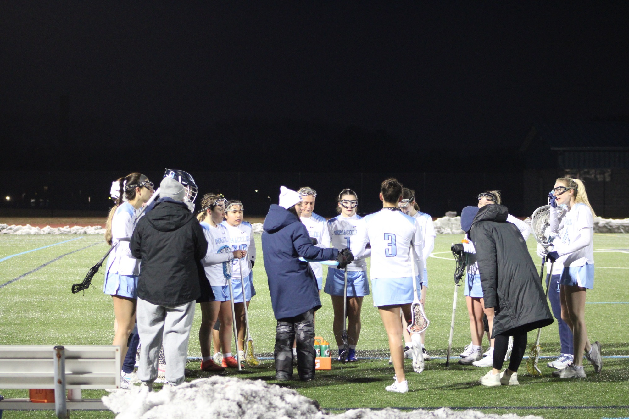 IWLax 2026 team huddle