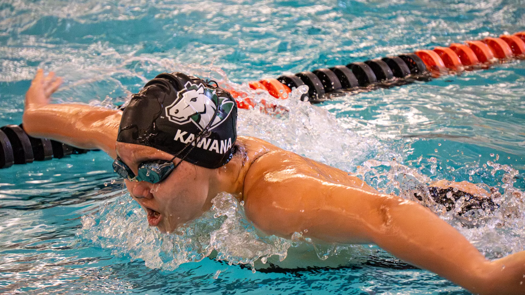 Sydney Kawana swimming the 100Fly