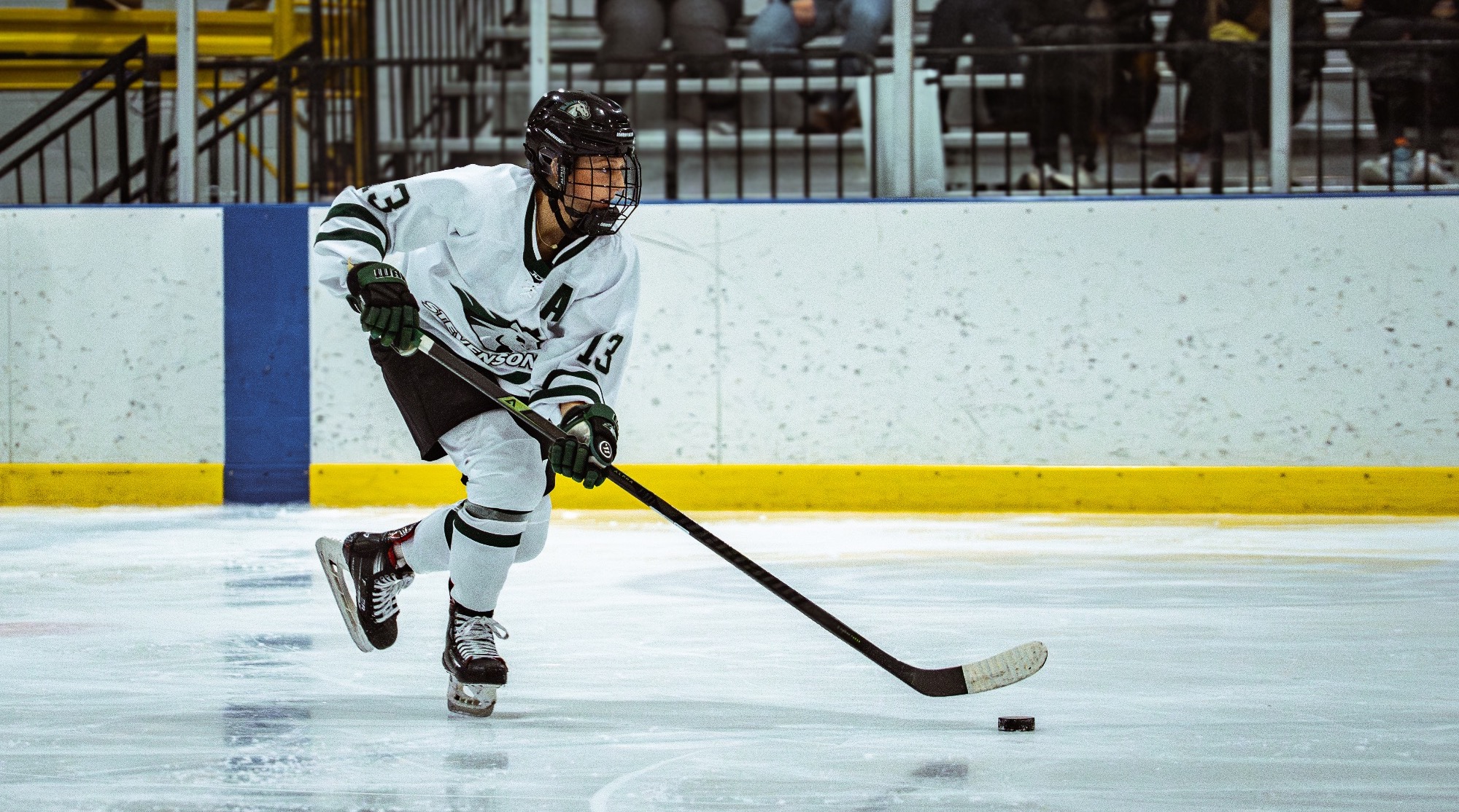 smith taking the puck down ice